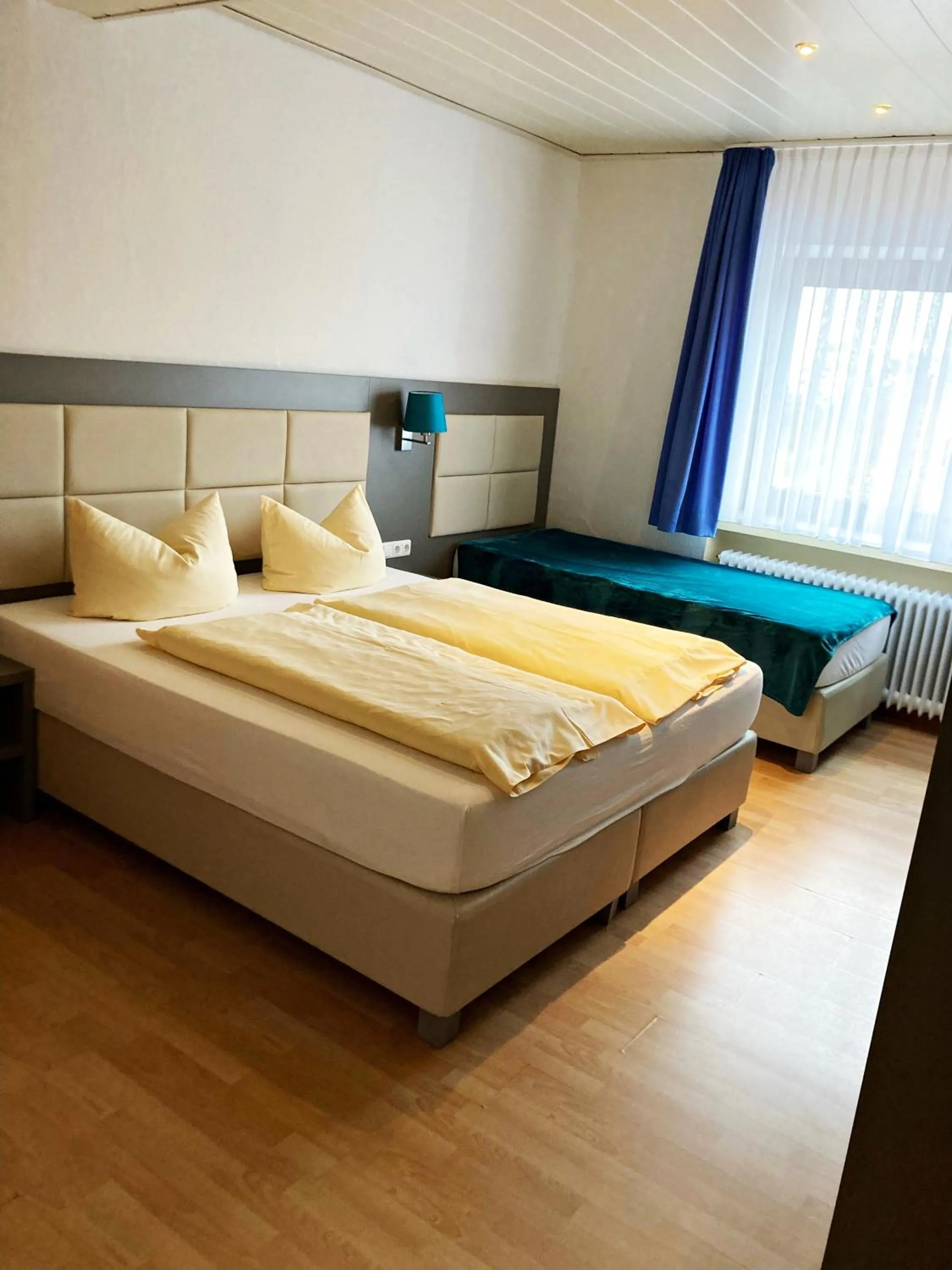 Bed in Familien- und Aparthotel Strandhof