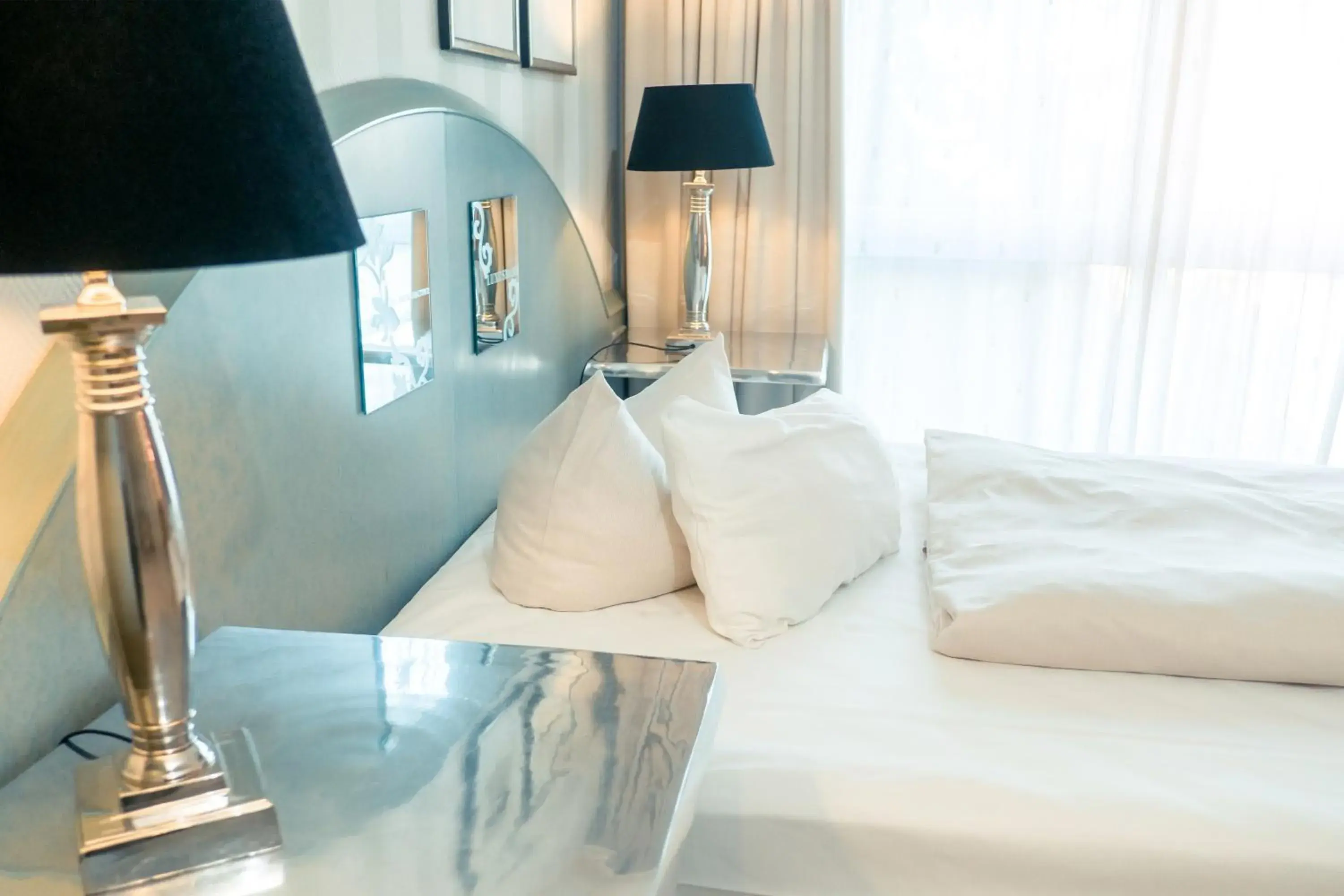 Photo of the whole room, Bed in Ambiente Langenhagen Hannover by Tulip Inn Photo of the whole room, Bed in Ambiente Langenhagen Hannover by Tulip Inn