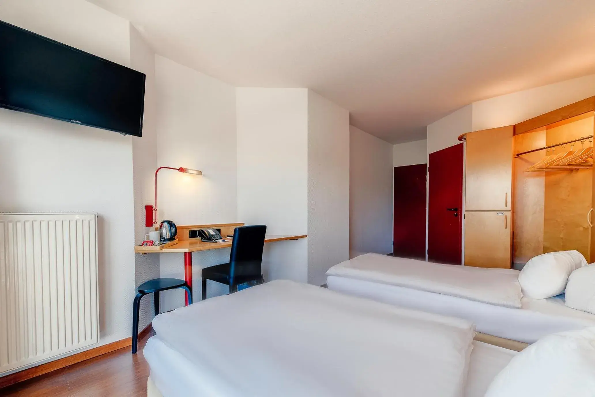 Photo of the whole room, Bed in Ambiente Langenhagen Hannover by Tulip Inn Photo of the whole room, Bed in Ambiente Langenhagen Hannover by Tulip Inn