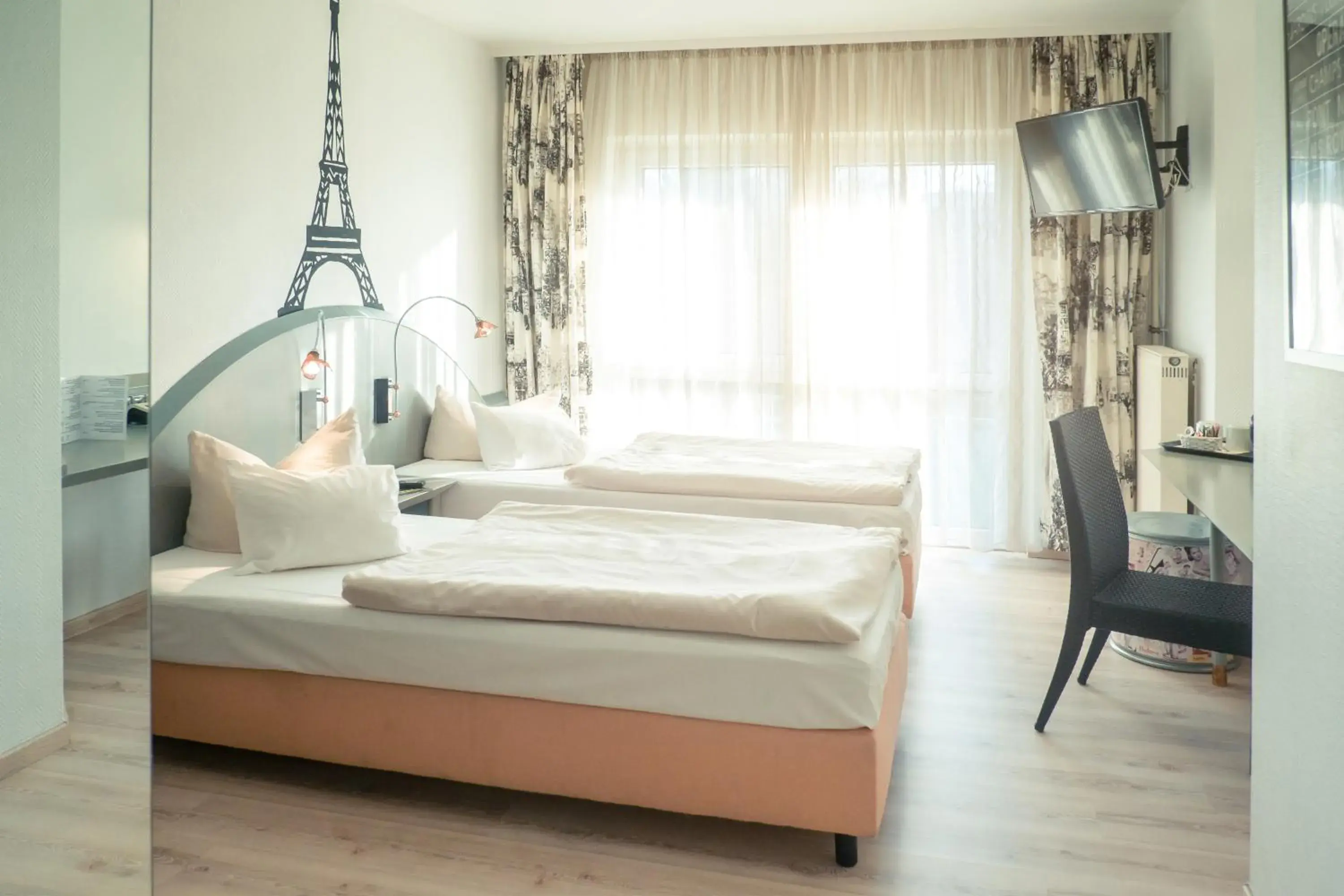 Bed in Ambiente Langenhagen Hannover by Tulip Inn Bed in Ambiente Langenhagen Hannover by Tulip Inn