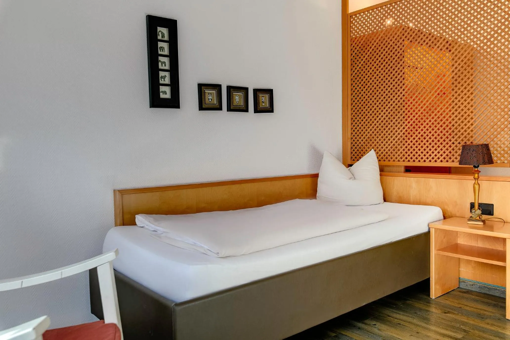 Photo of the whole room, Bed in Ambiente Langenhagen Hannover by Tulip Inn