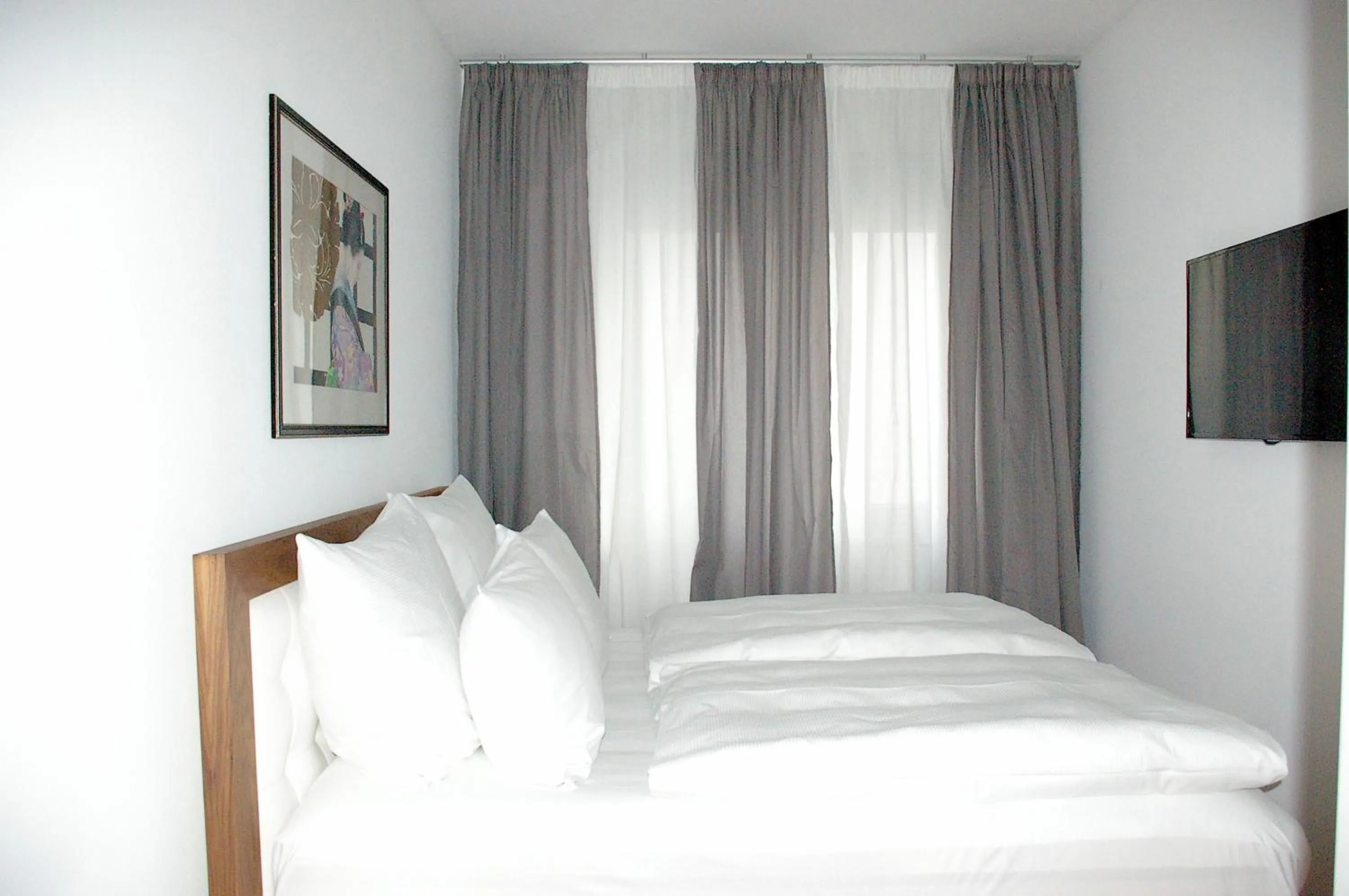 Bed in The Suite Hotel Garden