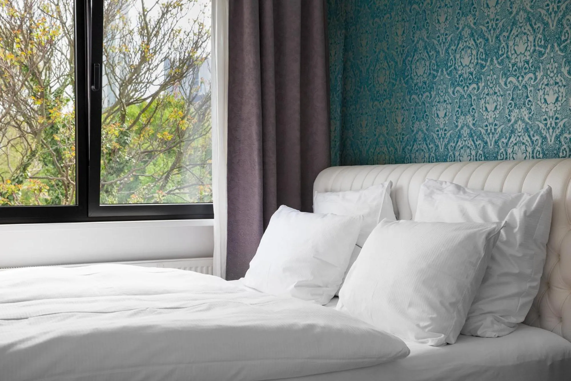 Bed in The Suite Hotel Garden