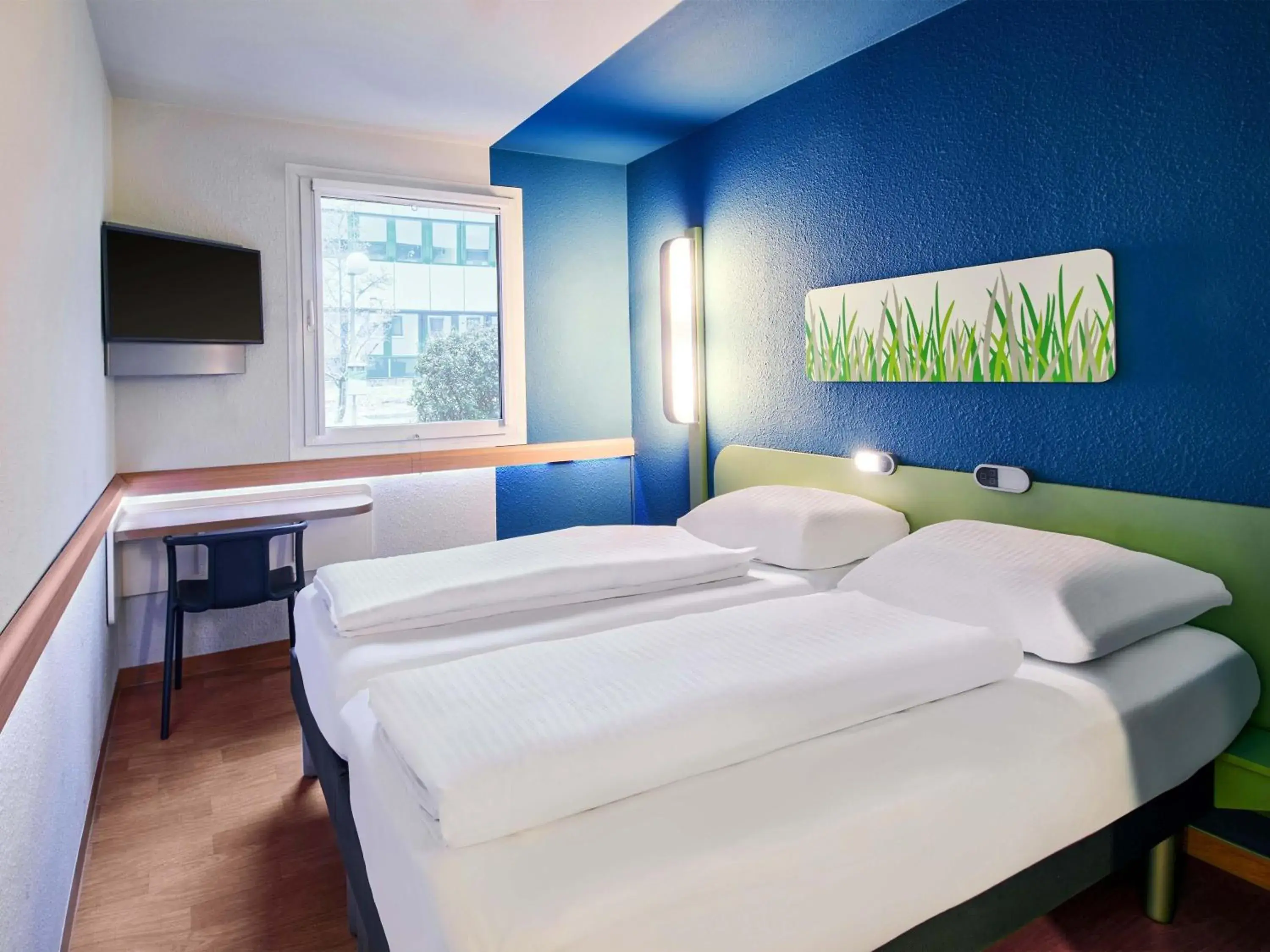 Bed in B&B HOTEL Bremen-Süd Bed in B&B HOTEL Bremen-Süd