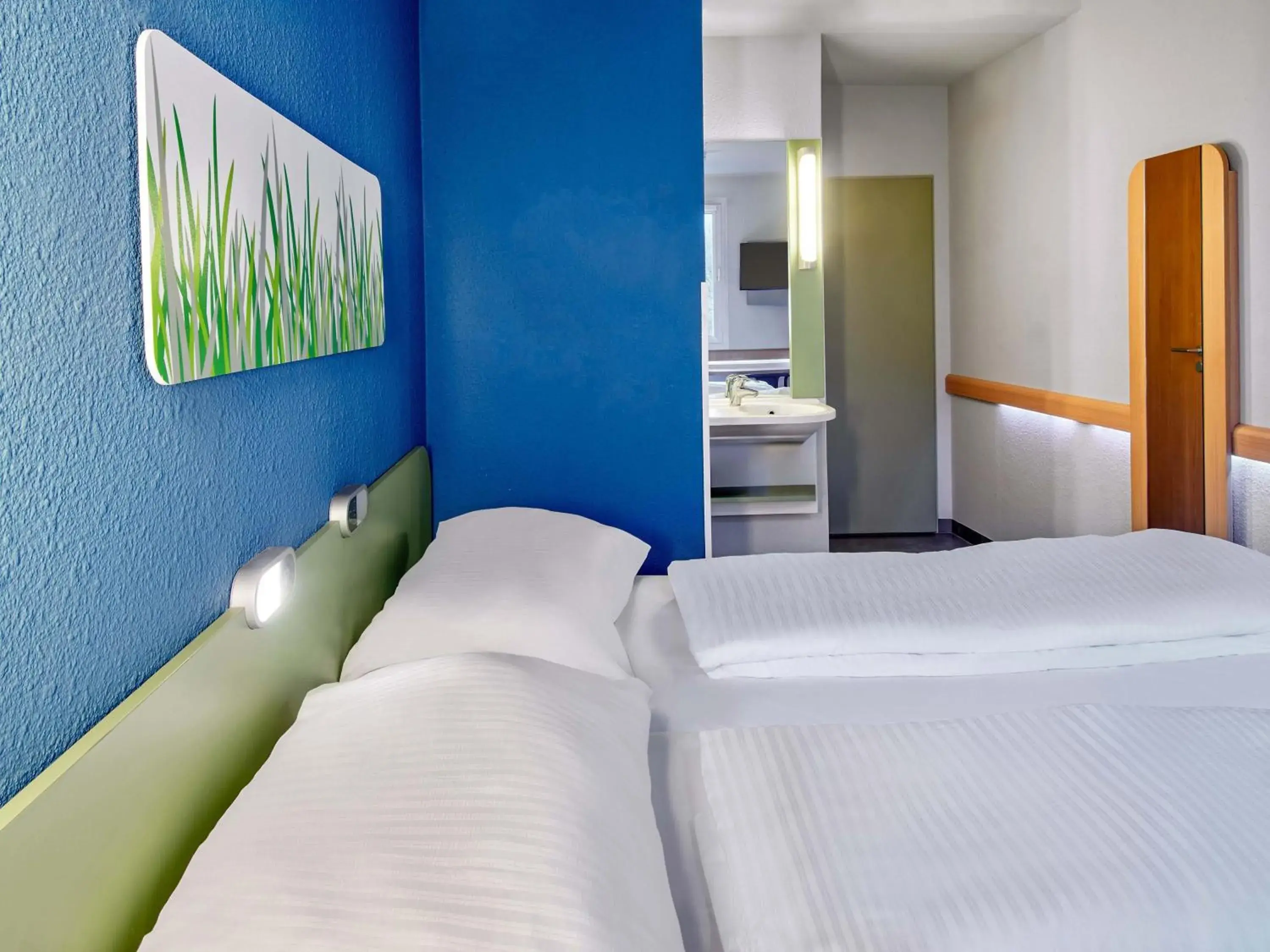 Bed in B&B HOTEL Bremen-Süd Bed in B&B HOTEL Bremen-Süd