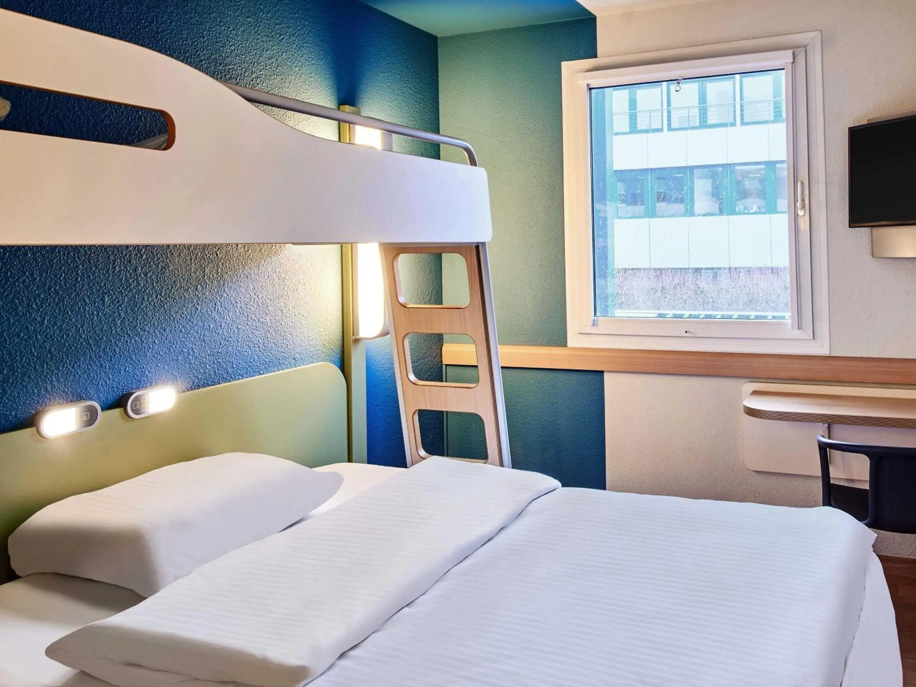 Bed in B&B HOTEL Bremen-Süd Bed in B&B HOTEL Bremen-Süd