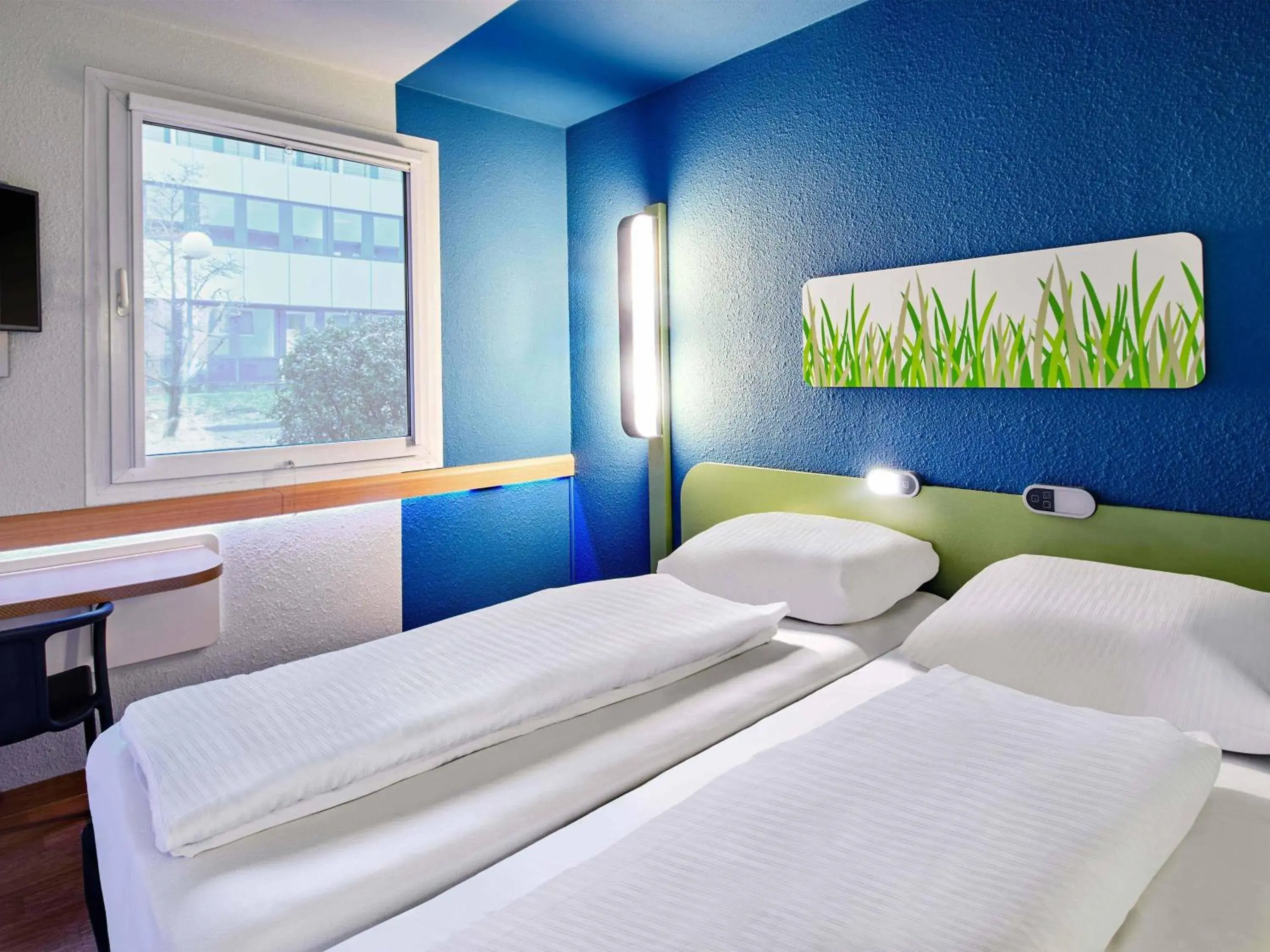 Bed in B&B HOTEL Bremen-Süd Bed in B&B HOTEL Bremen-Süd