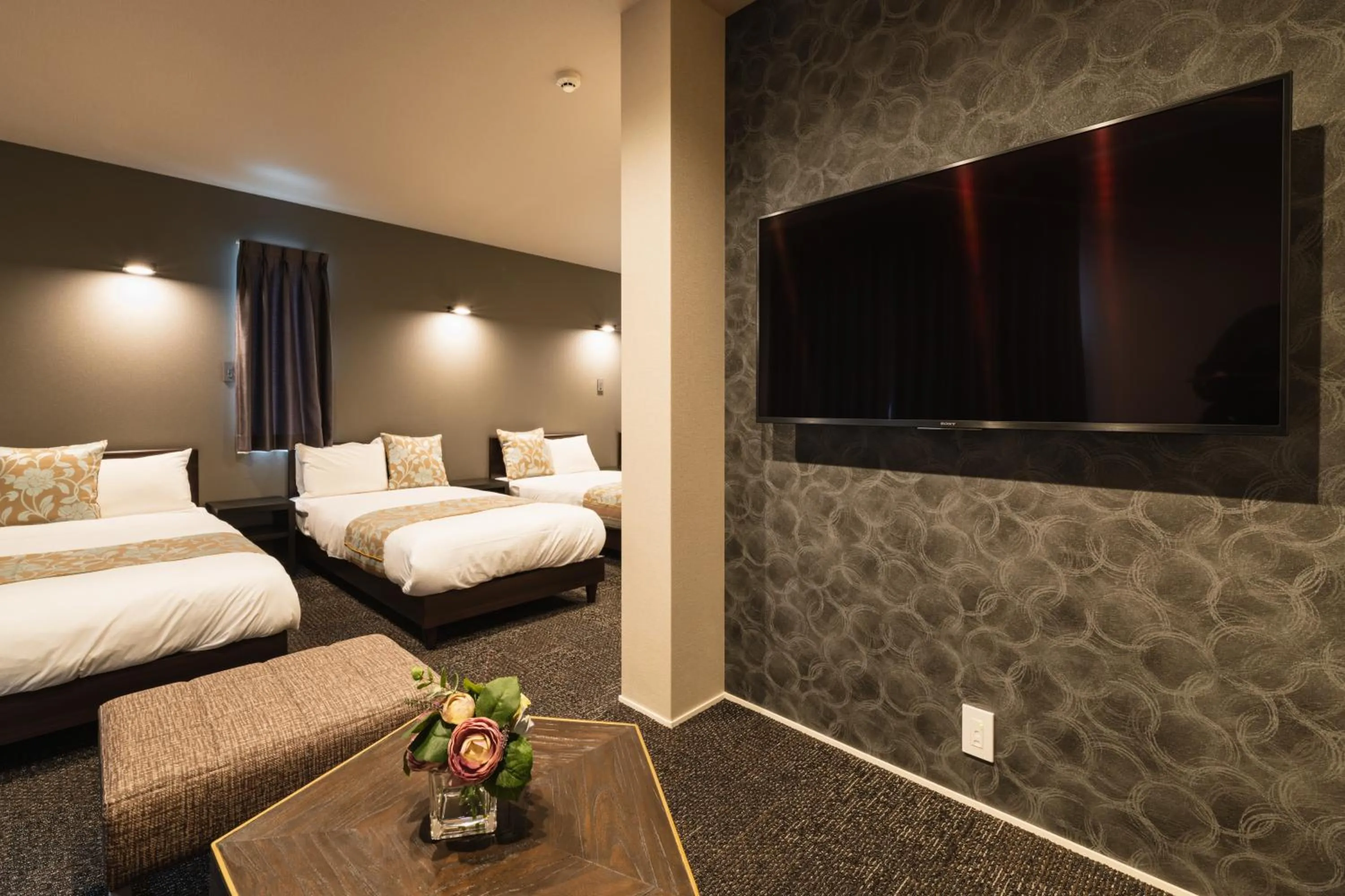 Photo of the whole room, Bed in GRAND BASE Nagasaki City