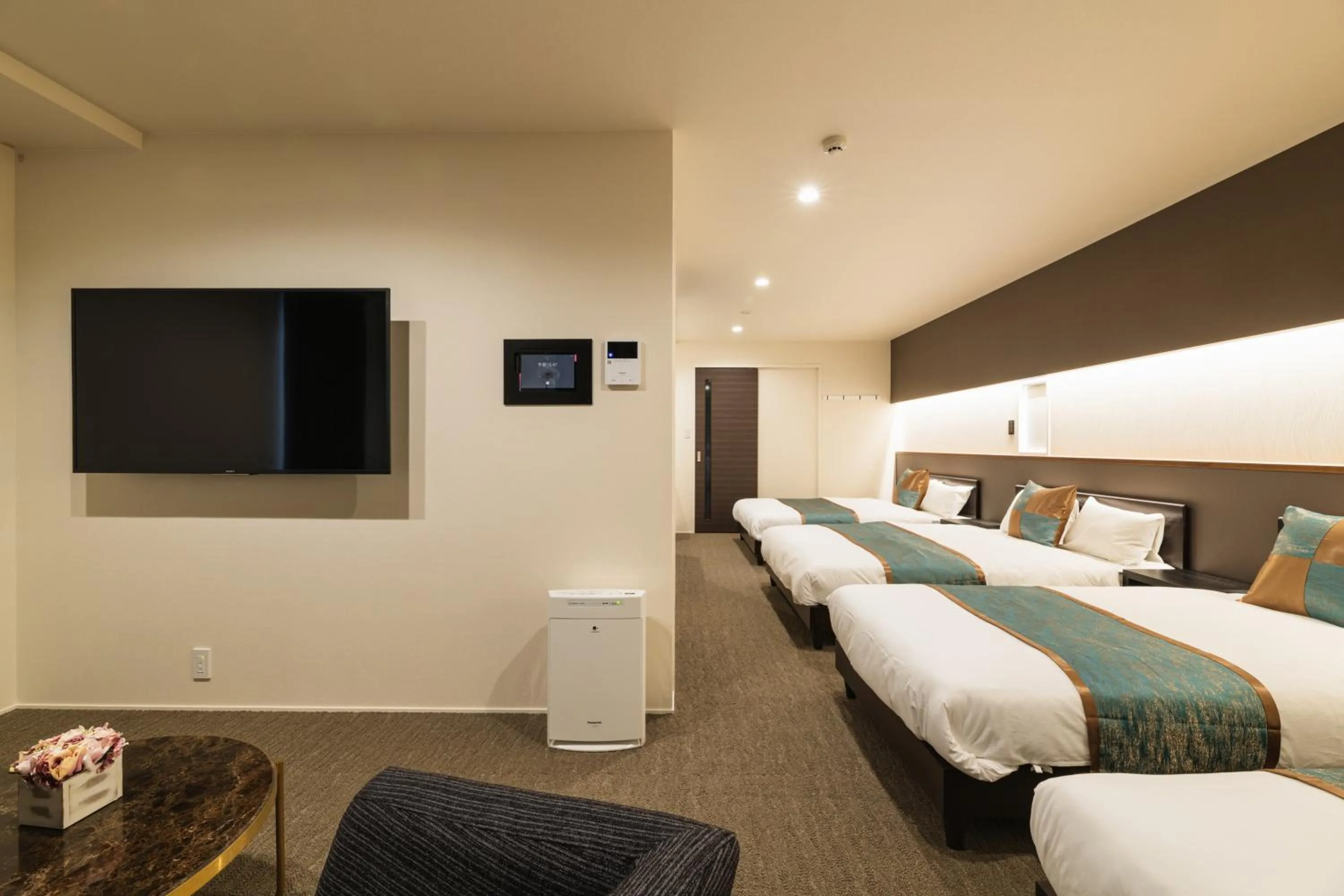 Photo of the whole room, Bed in GRAND BASE Nagasaki City