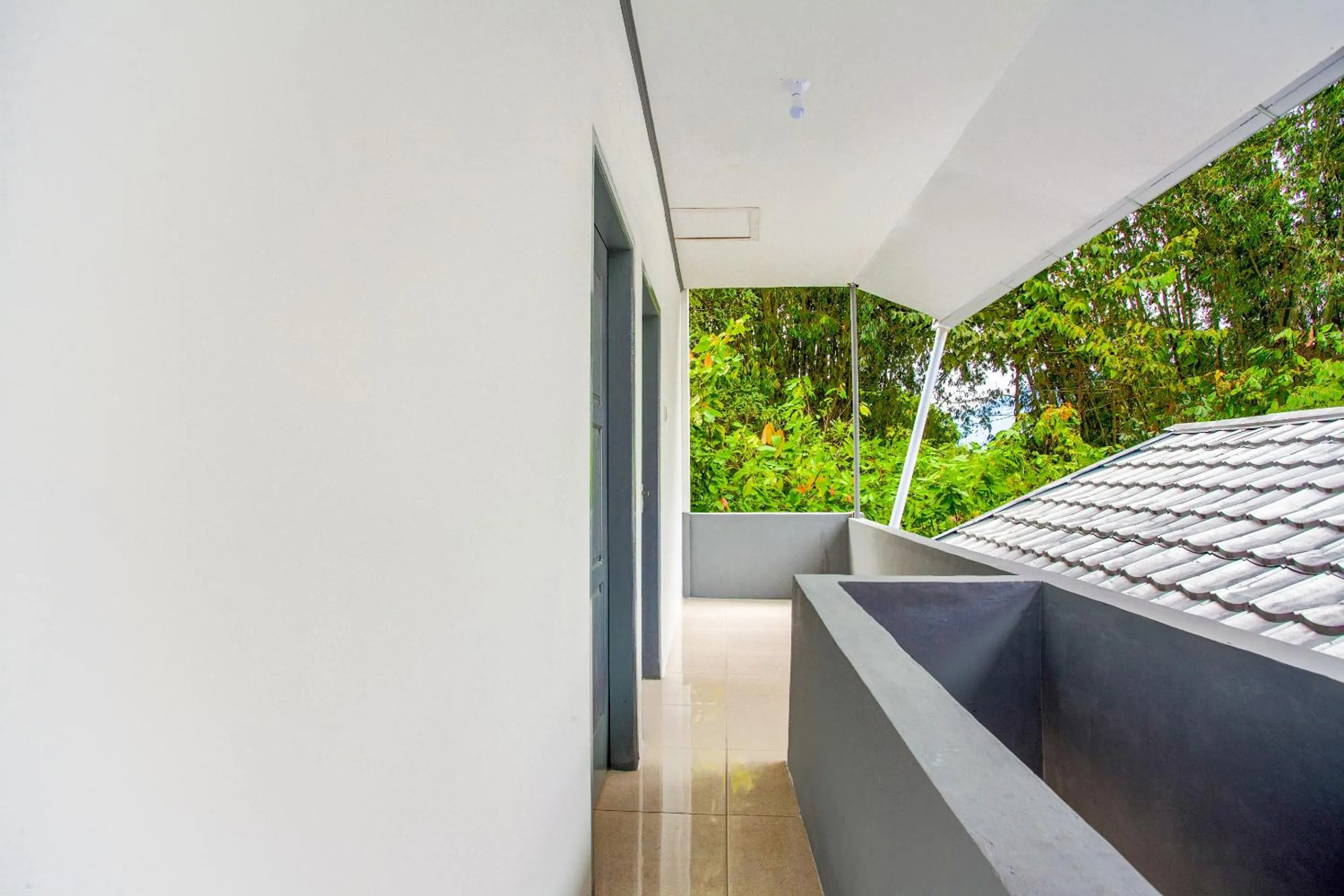 Lobby or reception in OYO 2903 Putri Residence Syariah