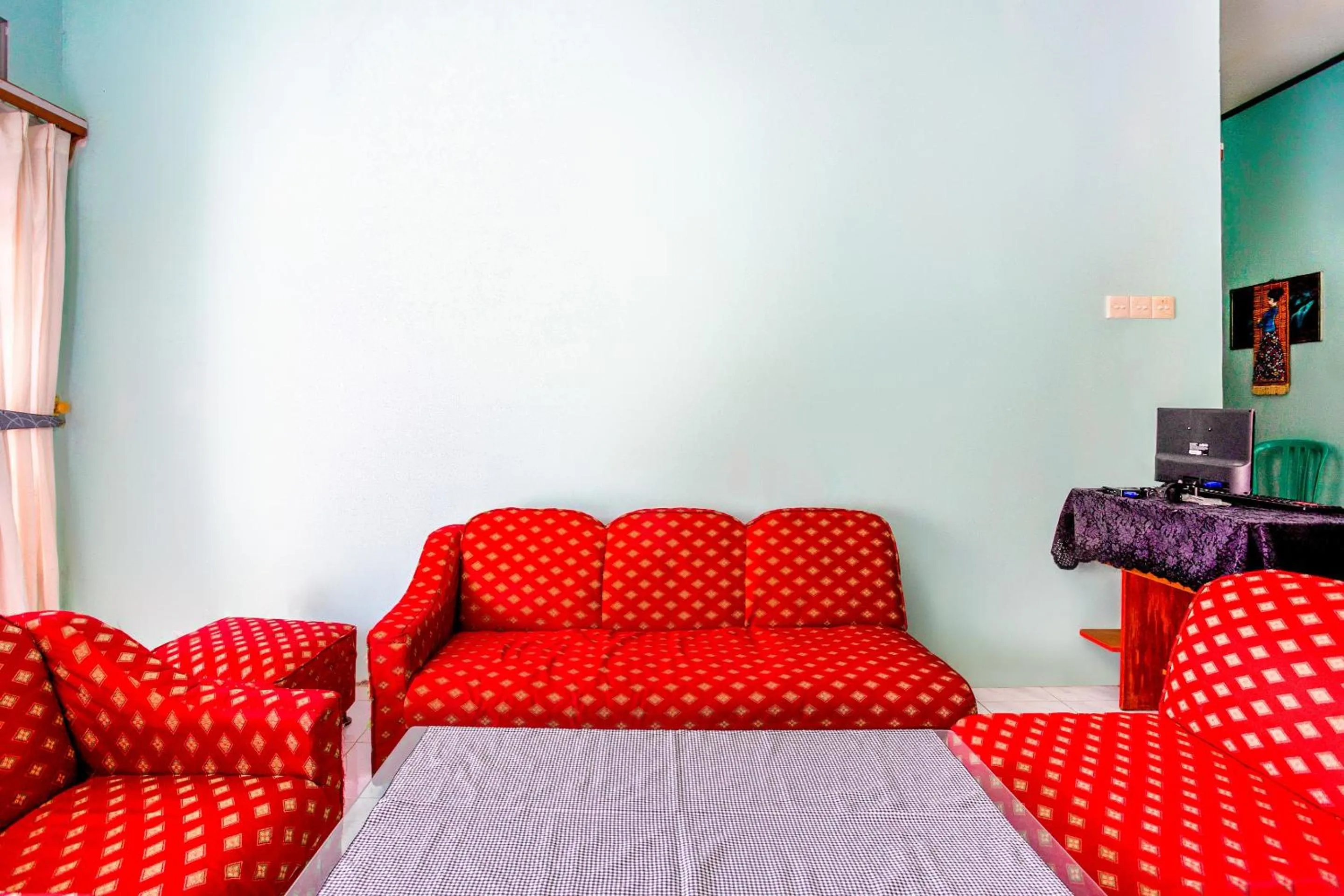 Lobby or reception in OYO 2903 Putri Residence Syariah