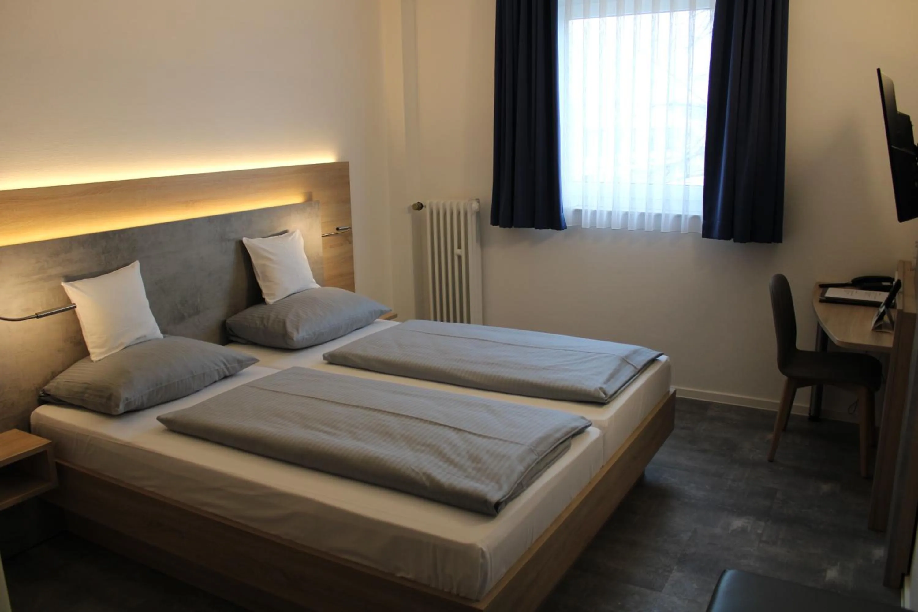 Bed in Hotel Am Vogelsanger Weg