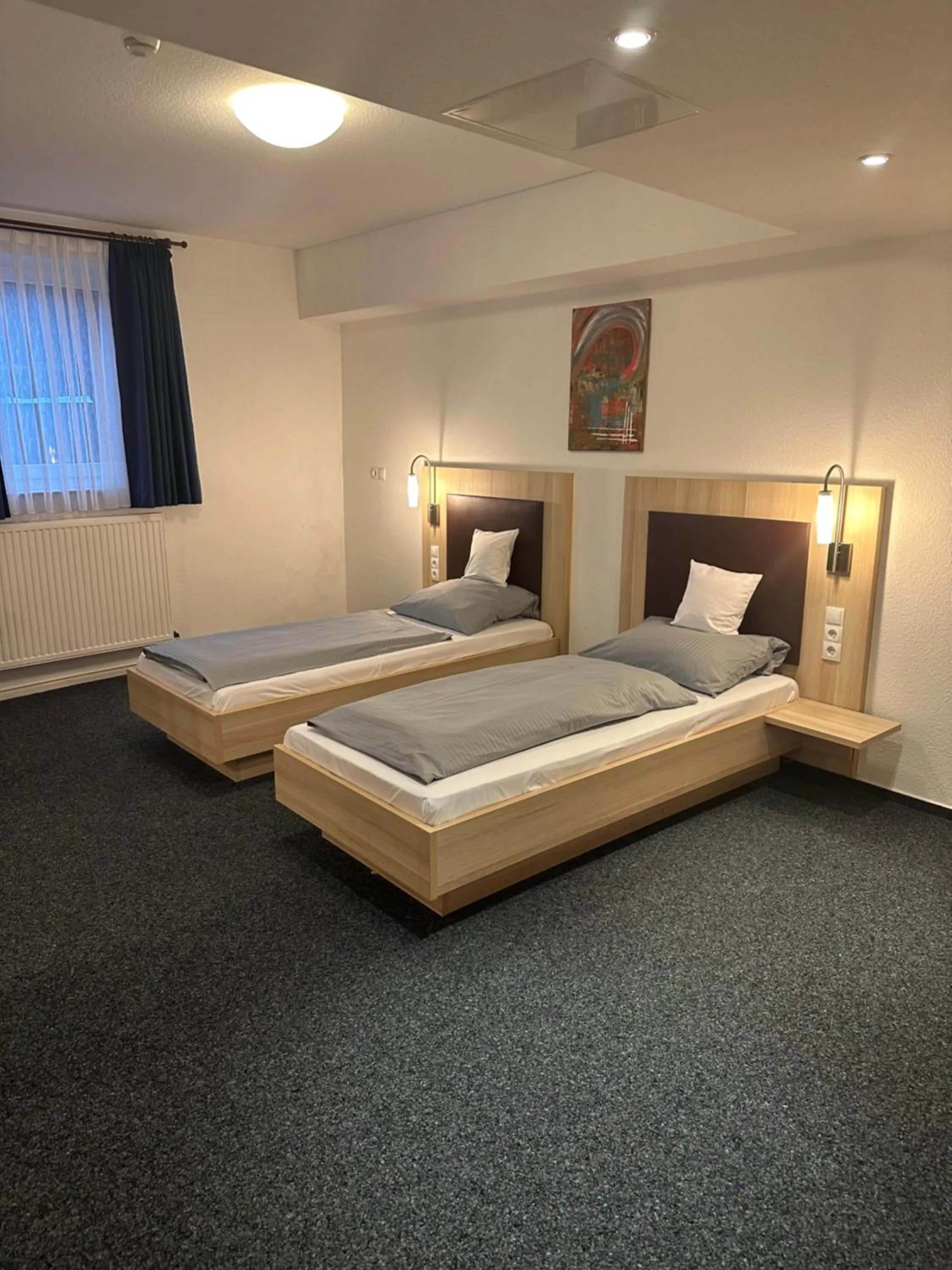 Bed in Hotel Am Vogelsanger Weg