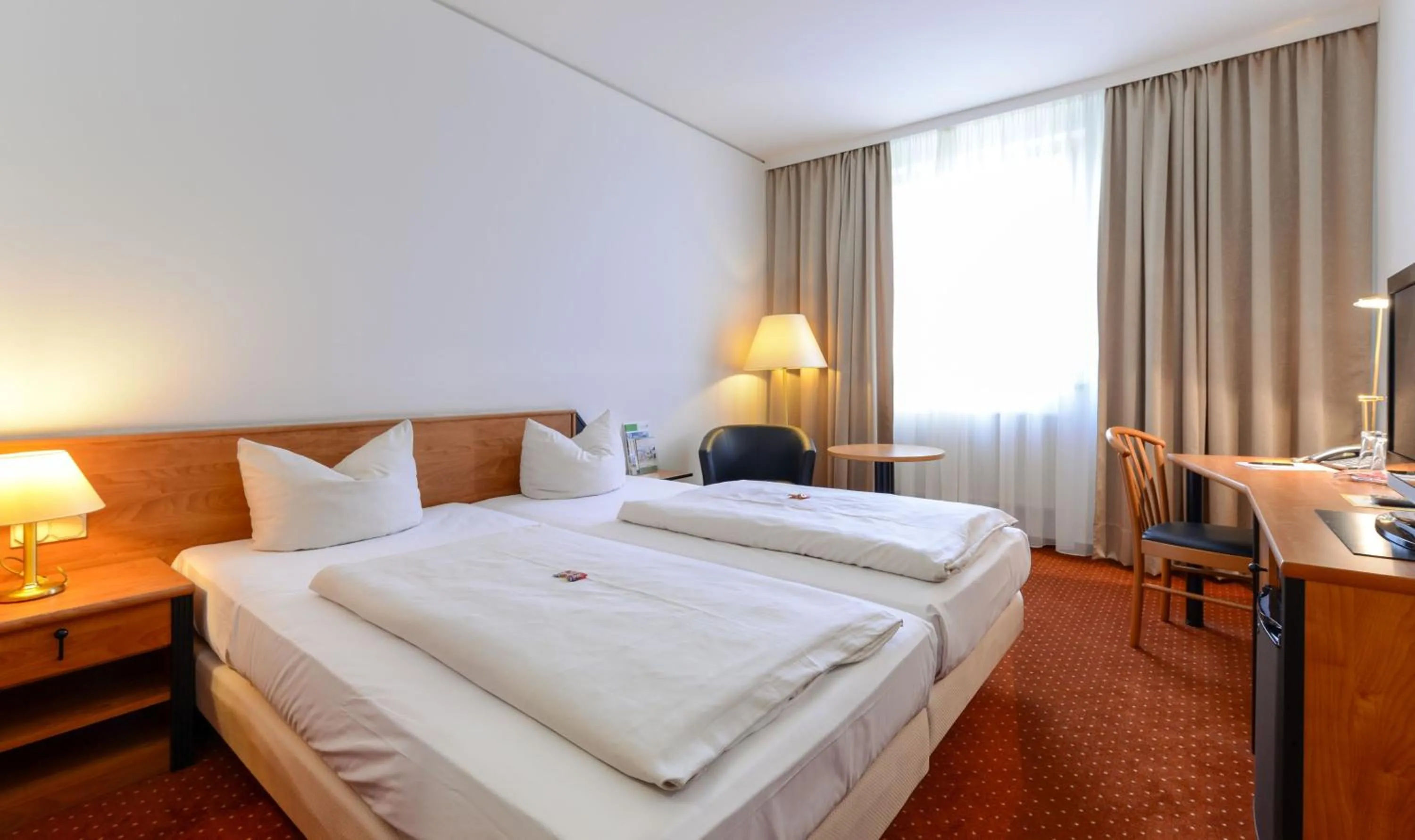 Photo of the whole room, Bed in NOVINA HOTEL Südwestpark