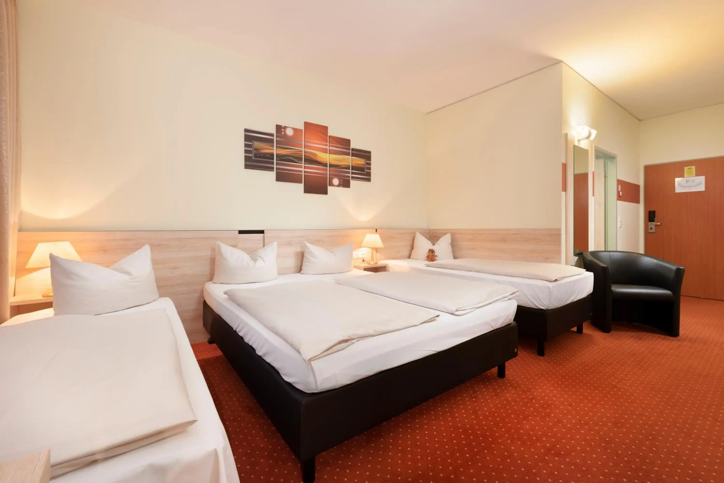 Bed in NOVINA HOTEL Sudwestpark