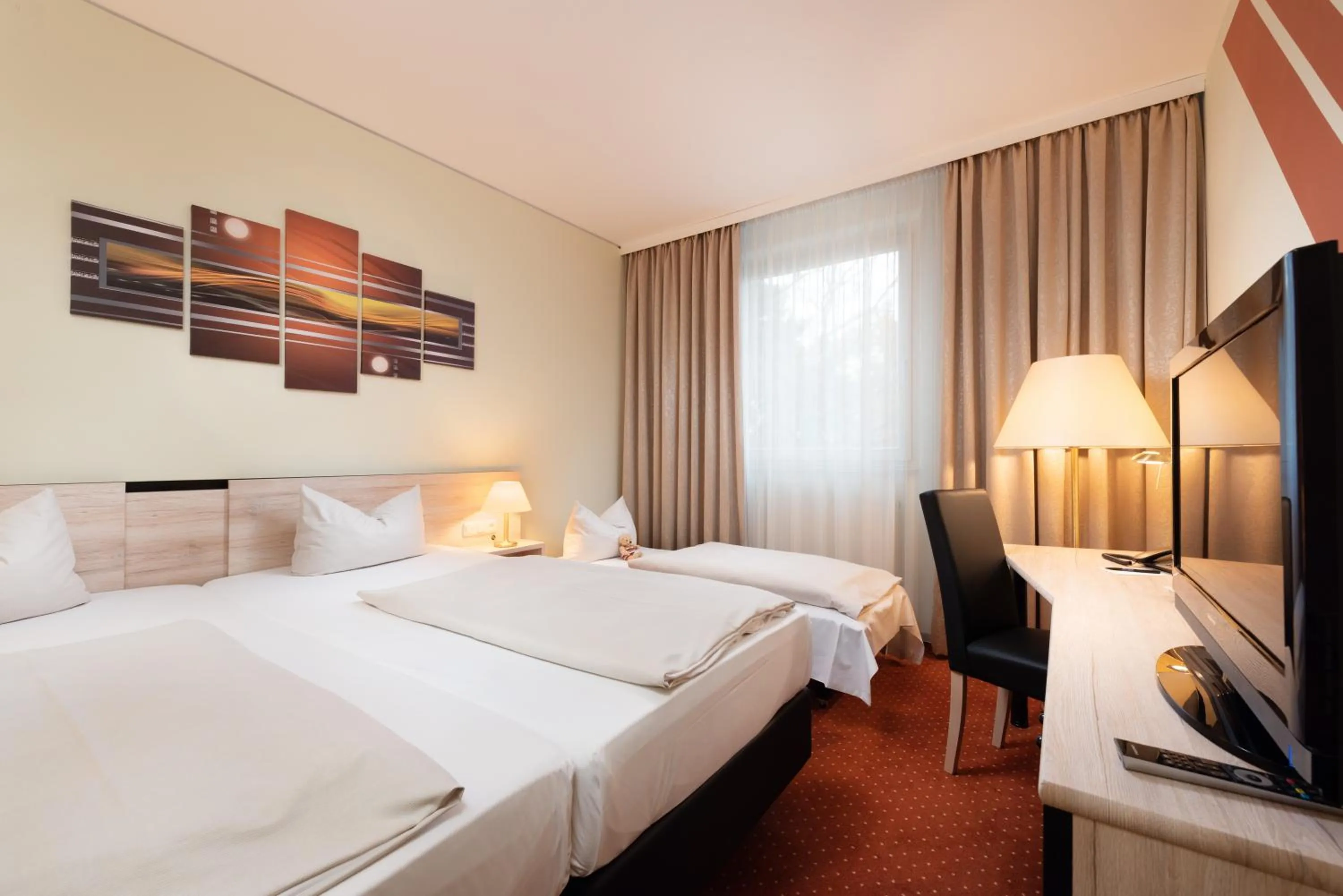 Bed in NOVINA HOTEL Südwestpark