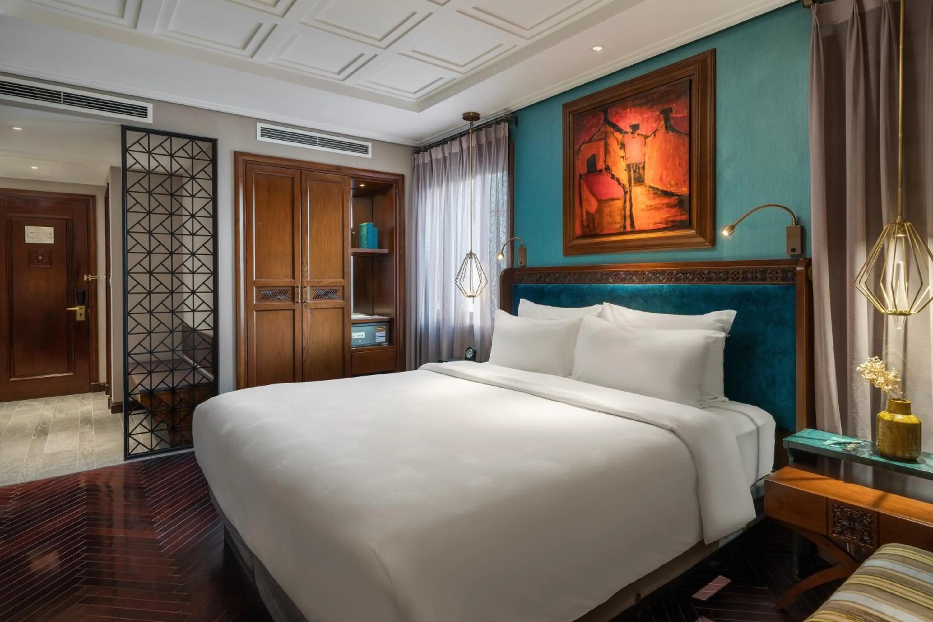 Bed in Peridot Grand Luxury Boutique Hotel