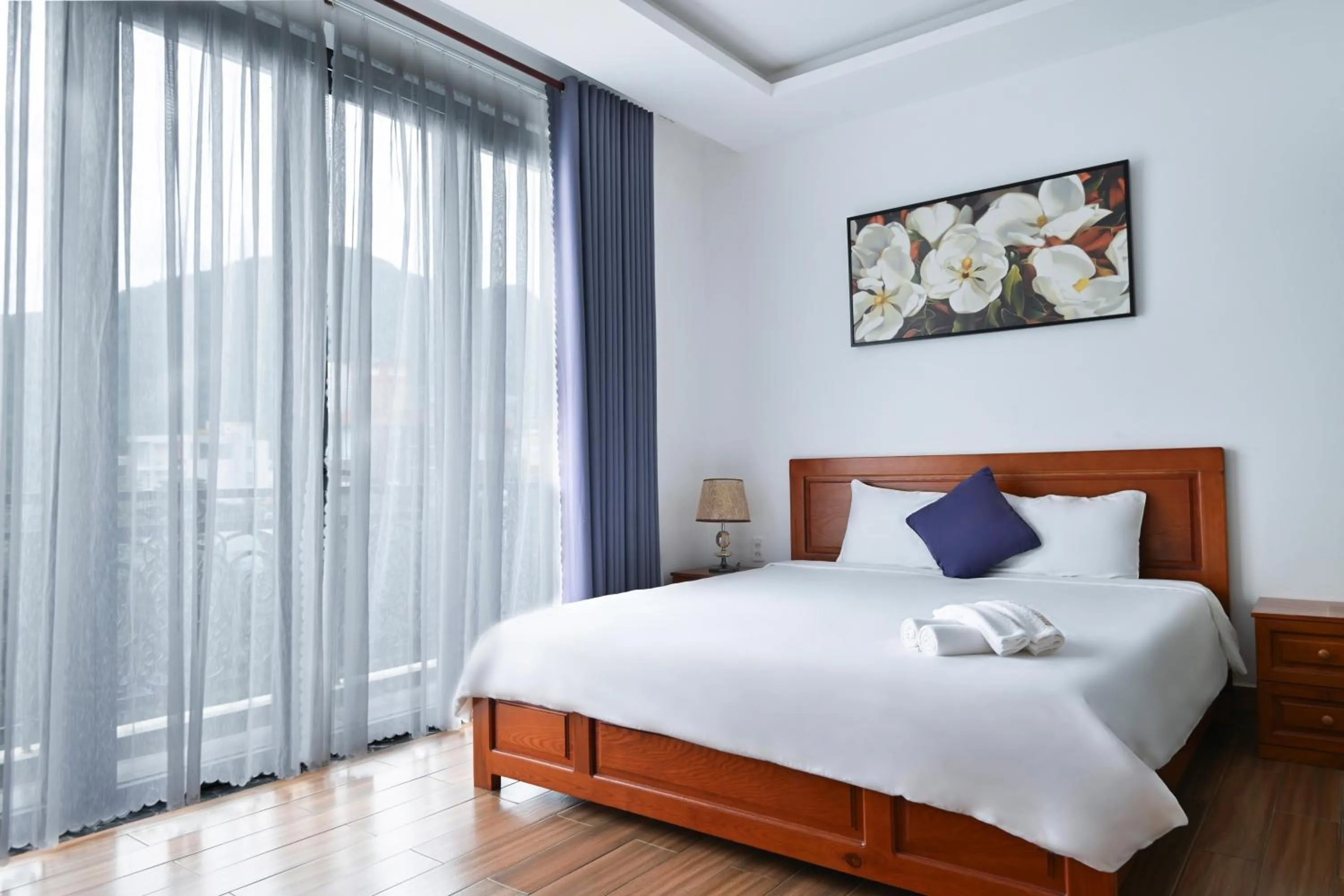 Living room, Bed in Kim Ngân Hotel