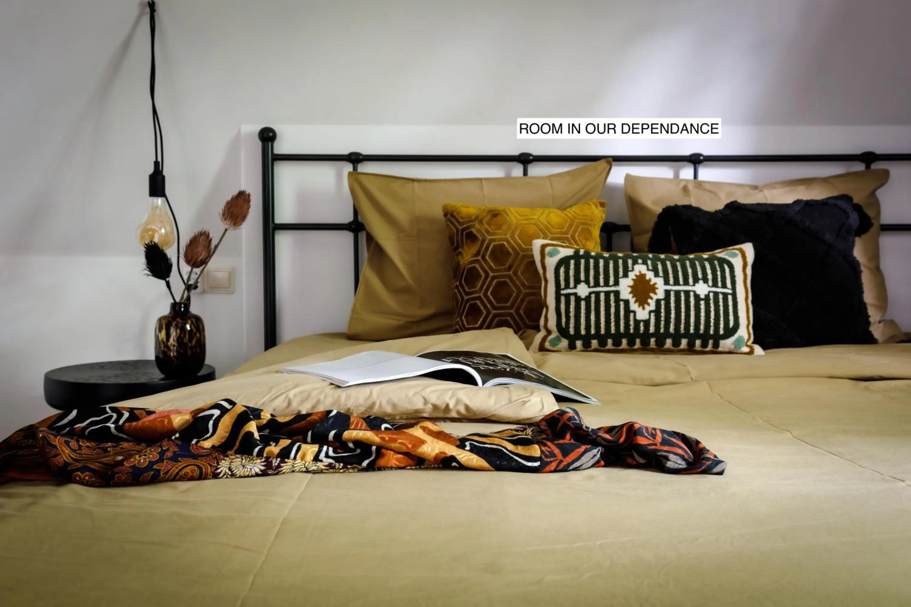 Bed in Stella Suites Boutique Hotel