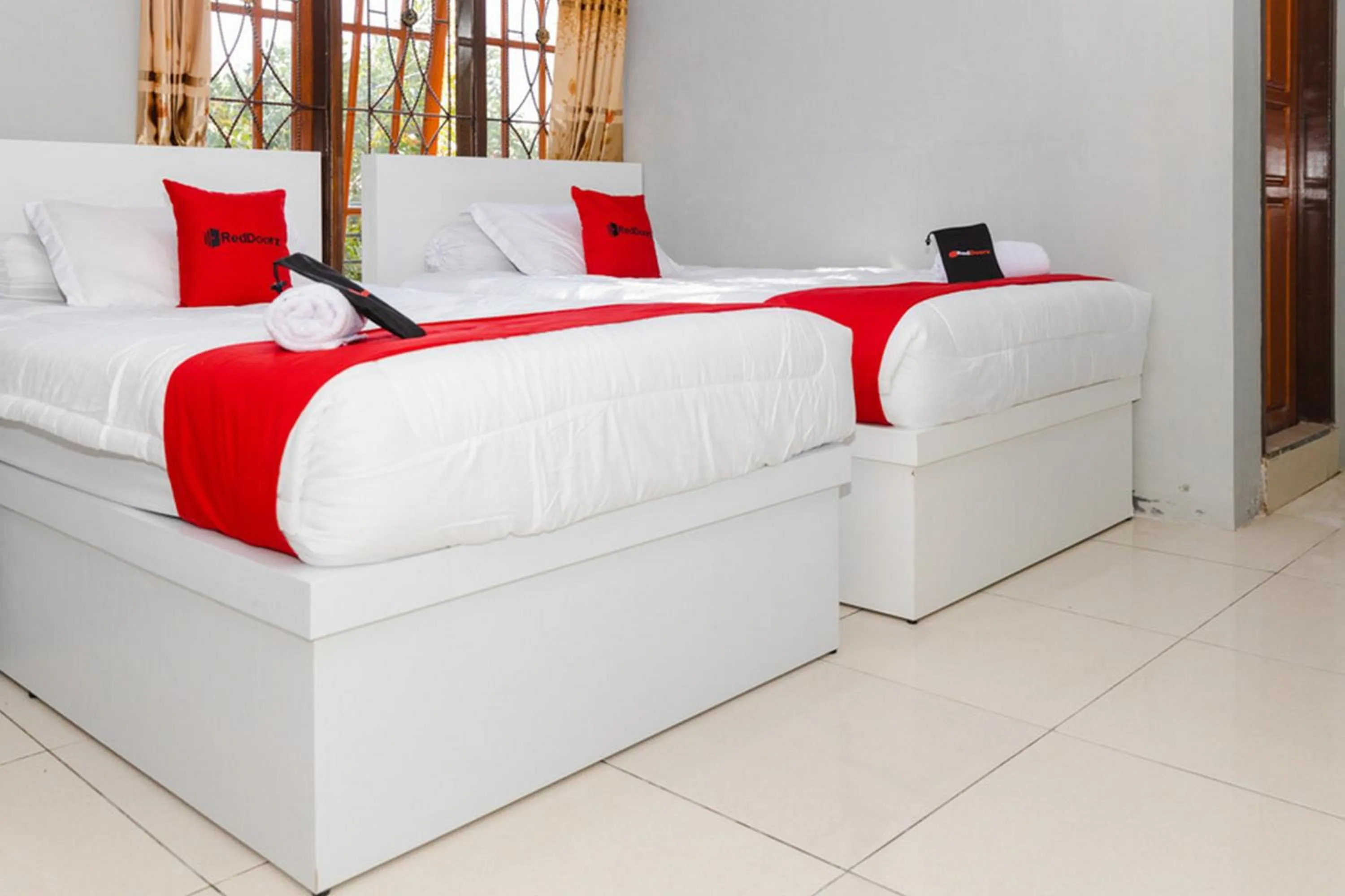 Bed in RedDoorz Plus near Transmart Kairagi Dua manado