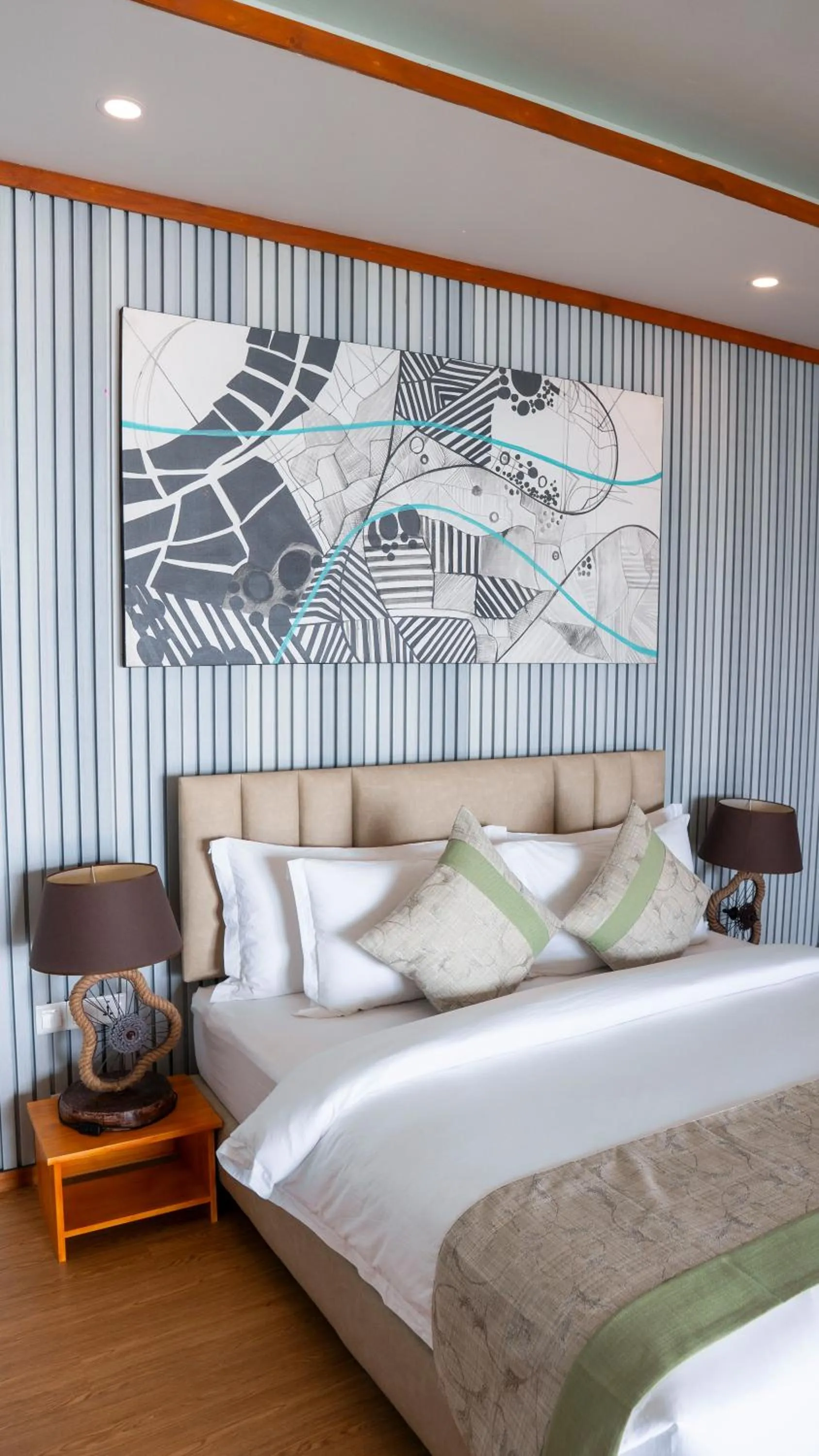 Bed in Brennia Kottefaru Maldives