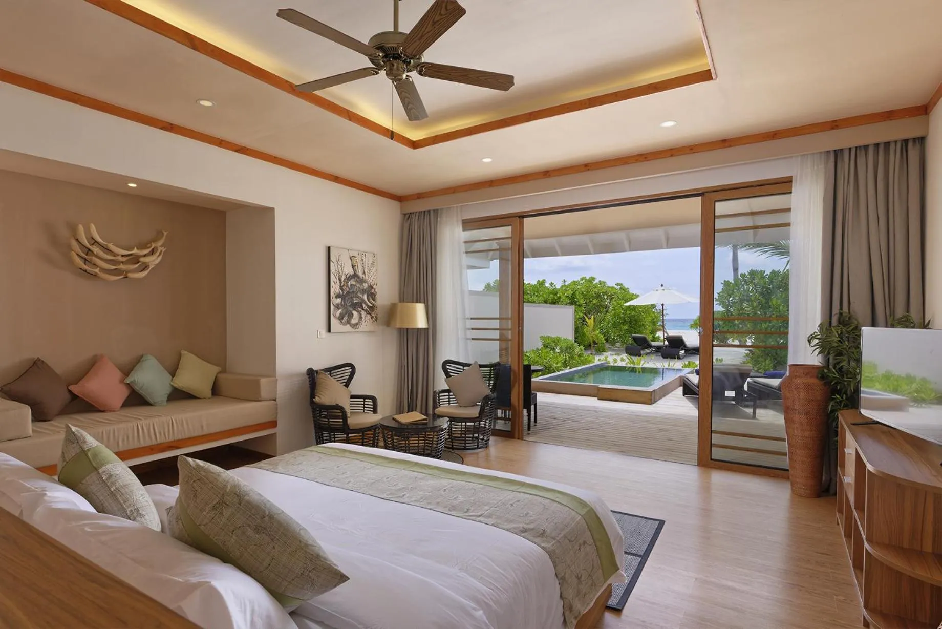 Bed in Brennia Kottefaru Maldives