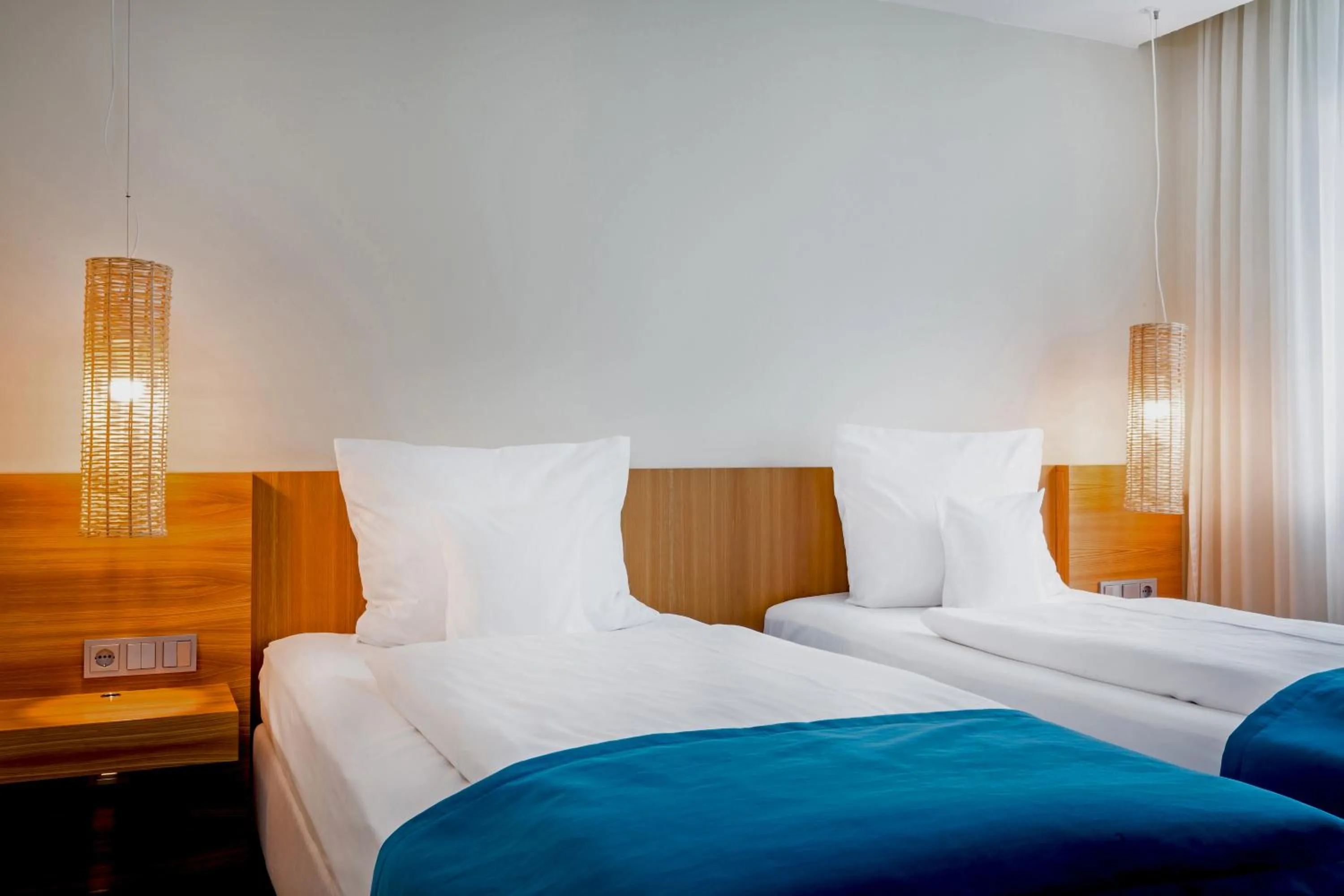 Bed in Lindner Hotel Berlin Ku'damm, part of JdV by Hyatt