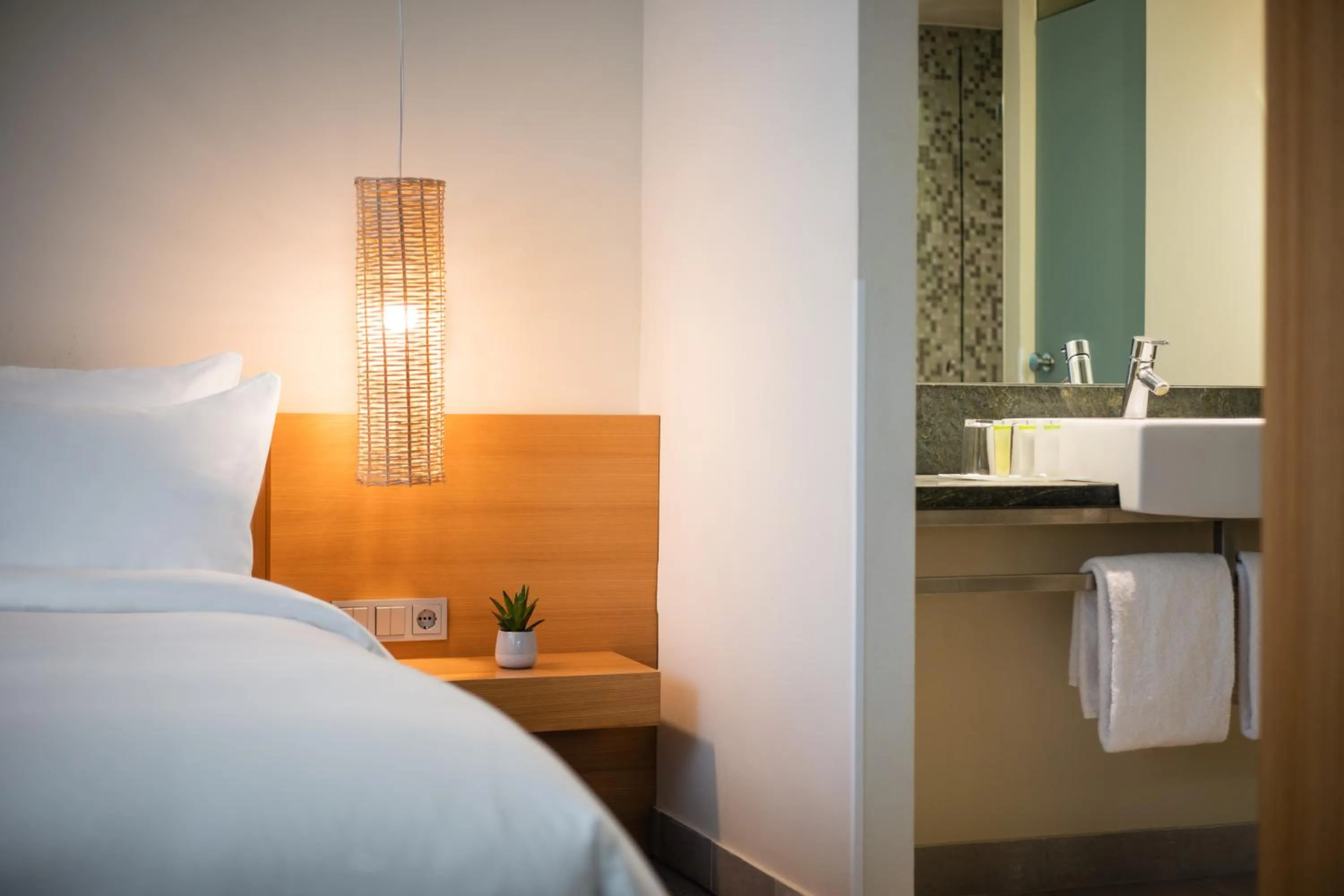 Bed in Lindner Hotel Berlin Ku'damm, part of JdV by Hyatt