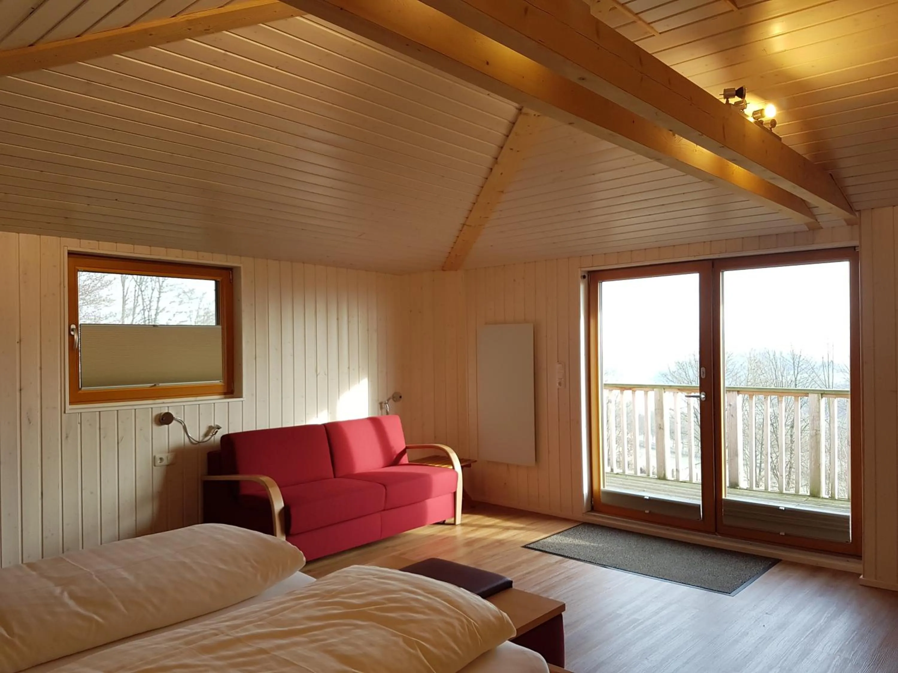 Bed in Hotel Waldquelle - Baumhaushotel Aerzen