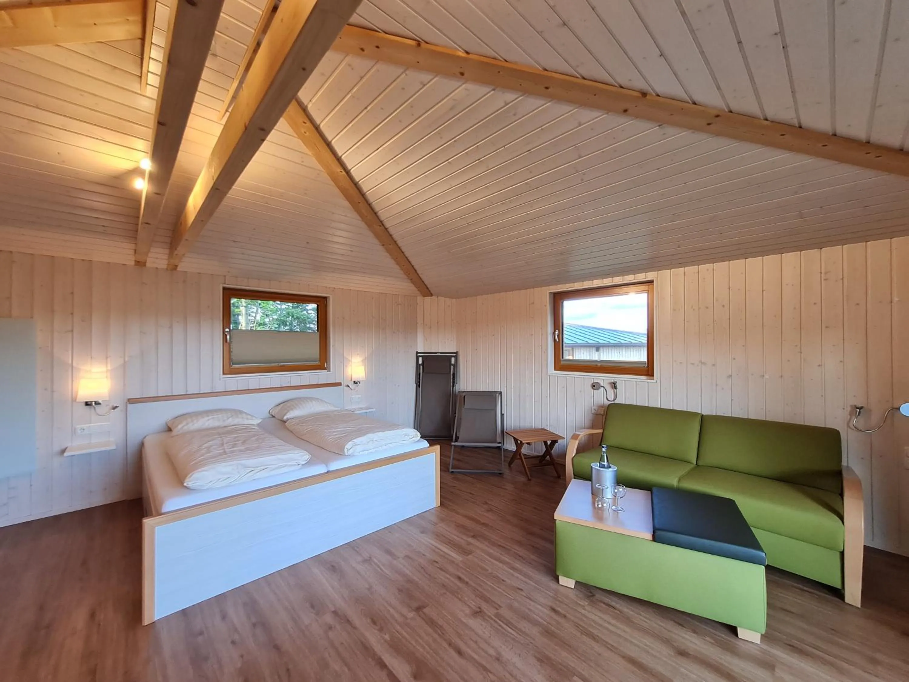 Bed in Hotel Waldquelle - Baumhaushotel Aerzen