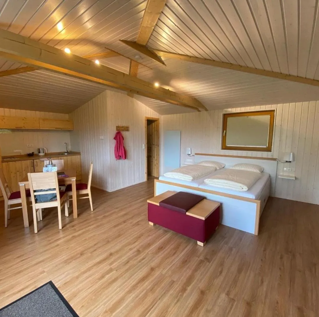 Bed in Hotel Waldquelle - Baumhaushotel Aerzen