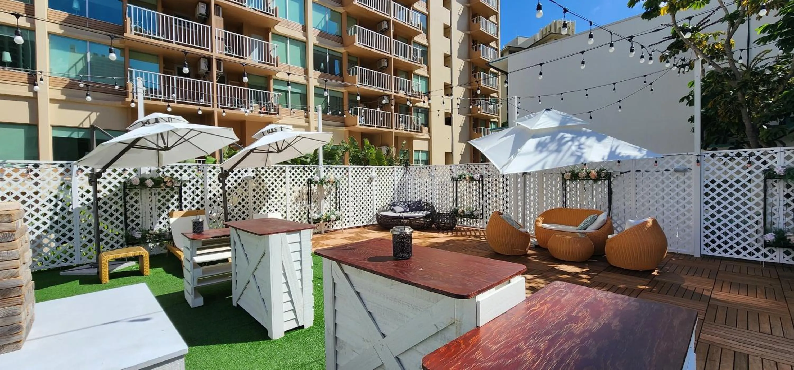 Communal lounge/ TV room in The Beach Waikiki Boutique Hostel