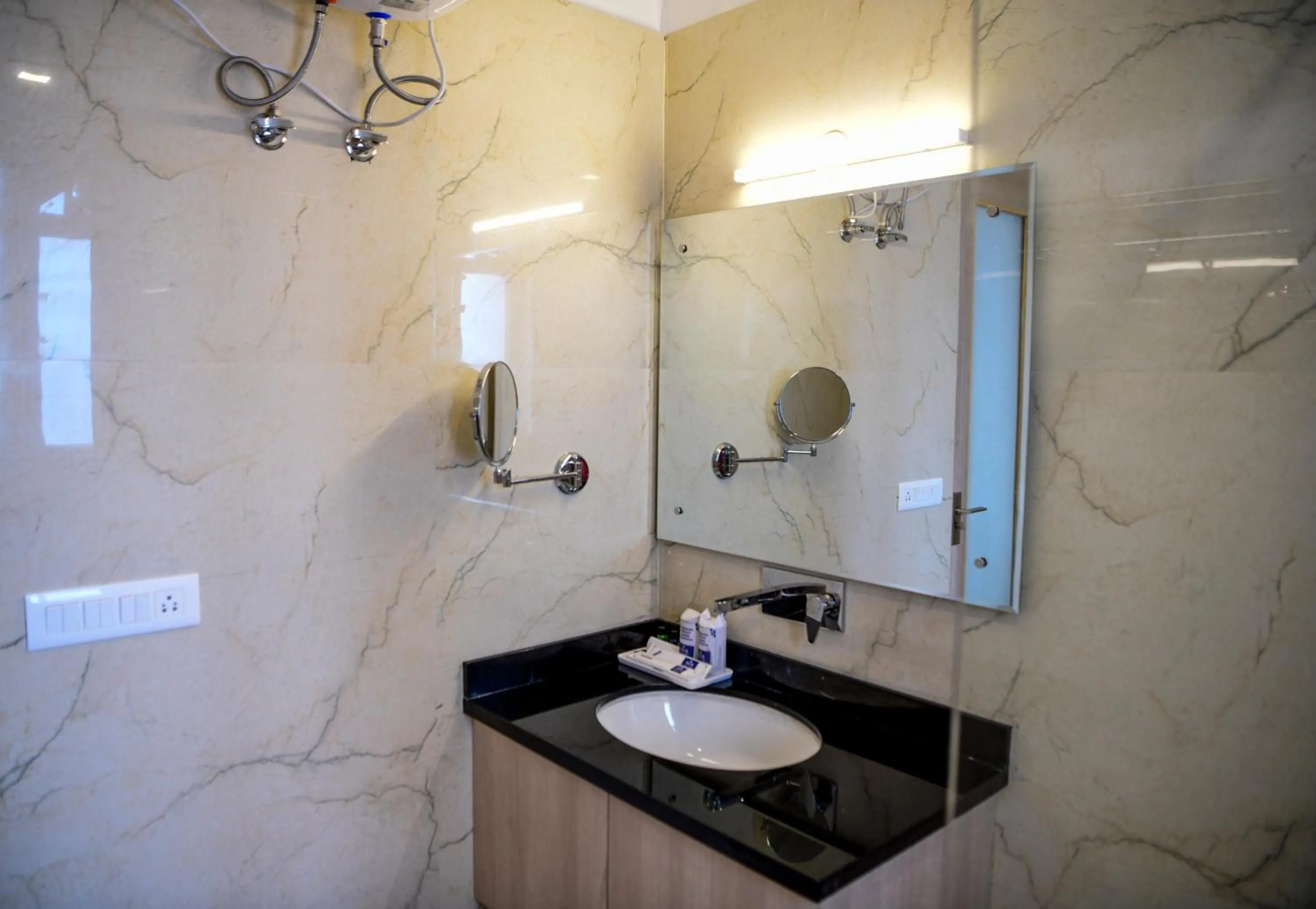 Bathroom in Hotel White Rock By The Solitaire Hospitality