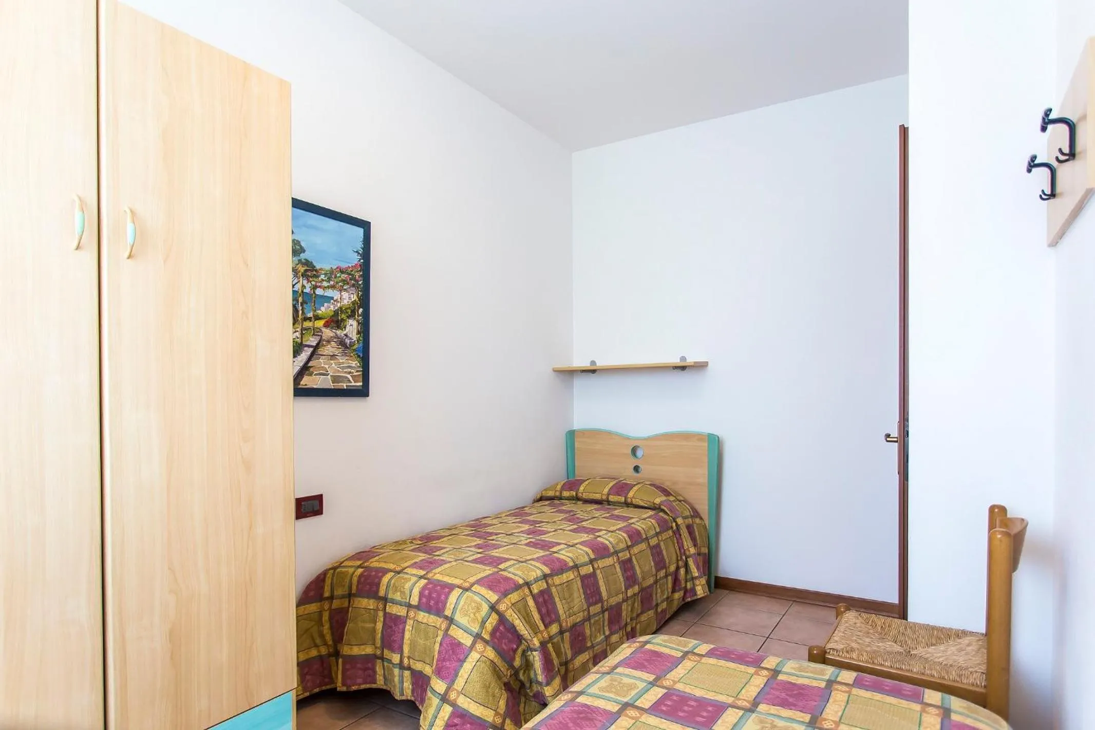 Bed in Villaggio Calycanthus