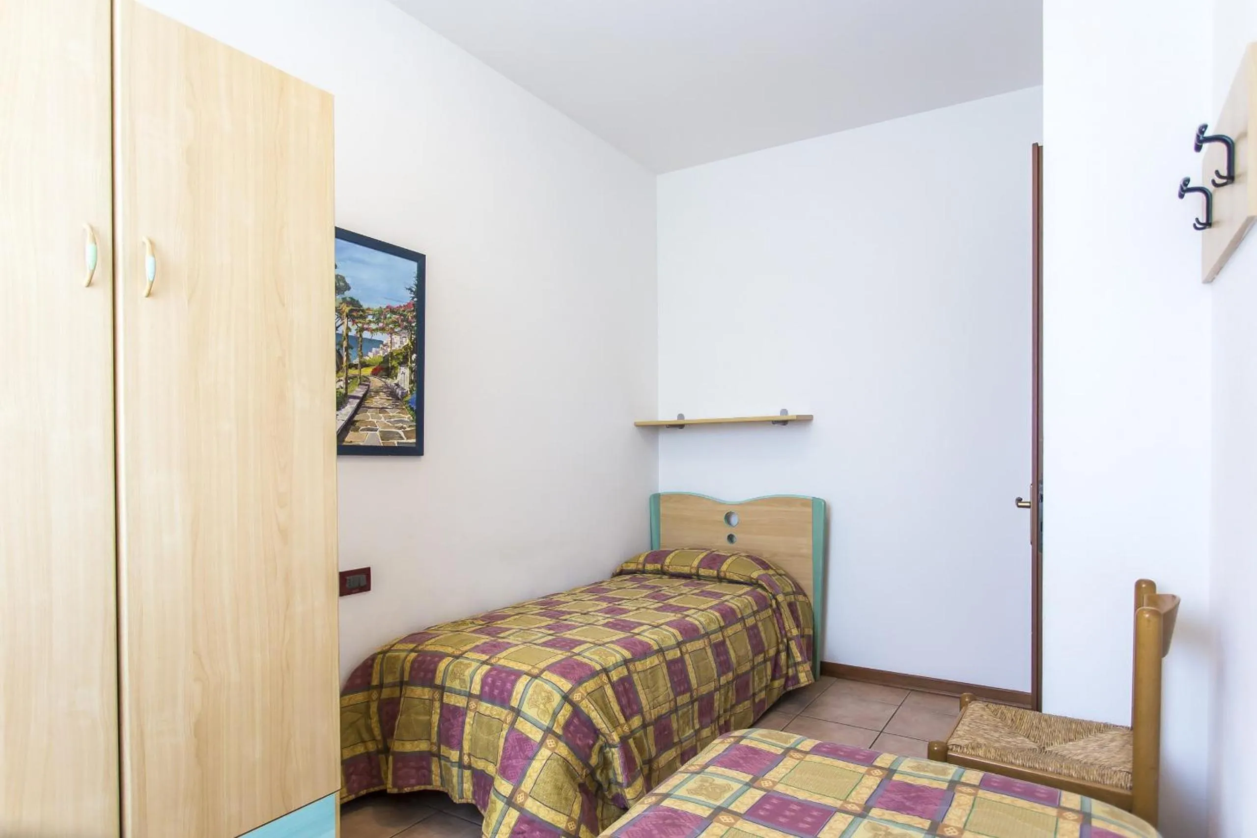 Bed in Villaggio Calycanthus