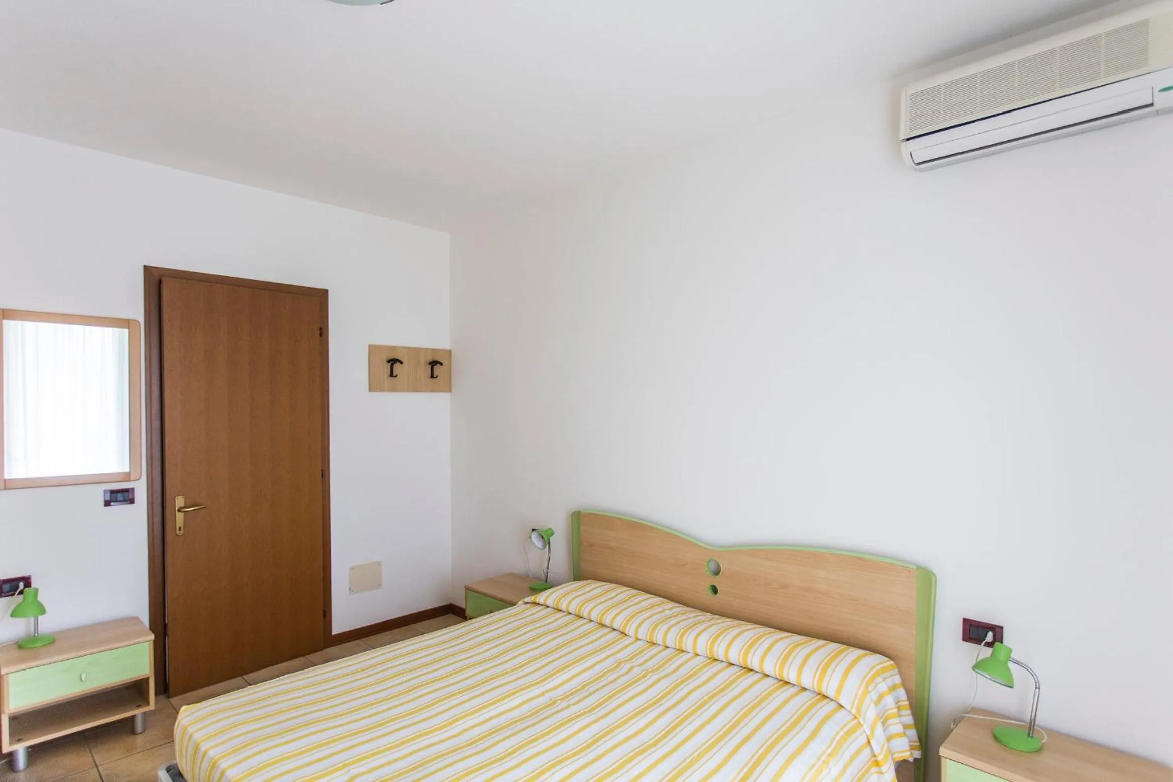 Bed in Villaggio Calycanthus