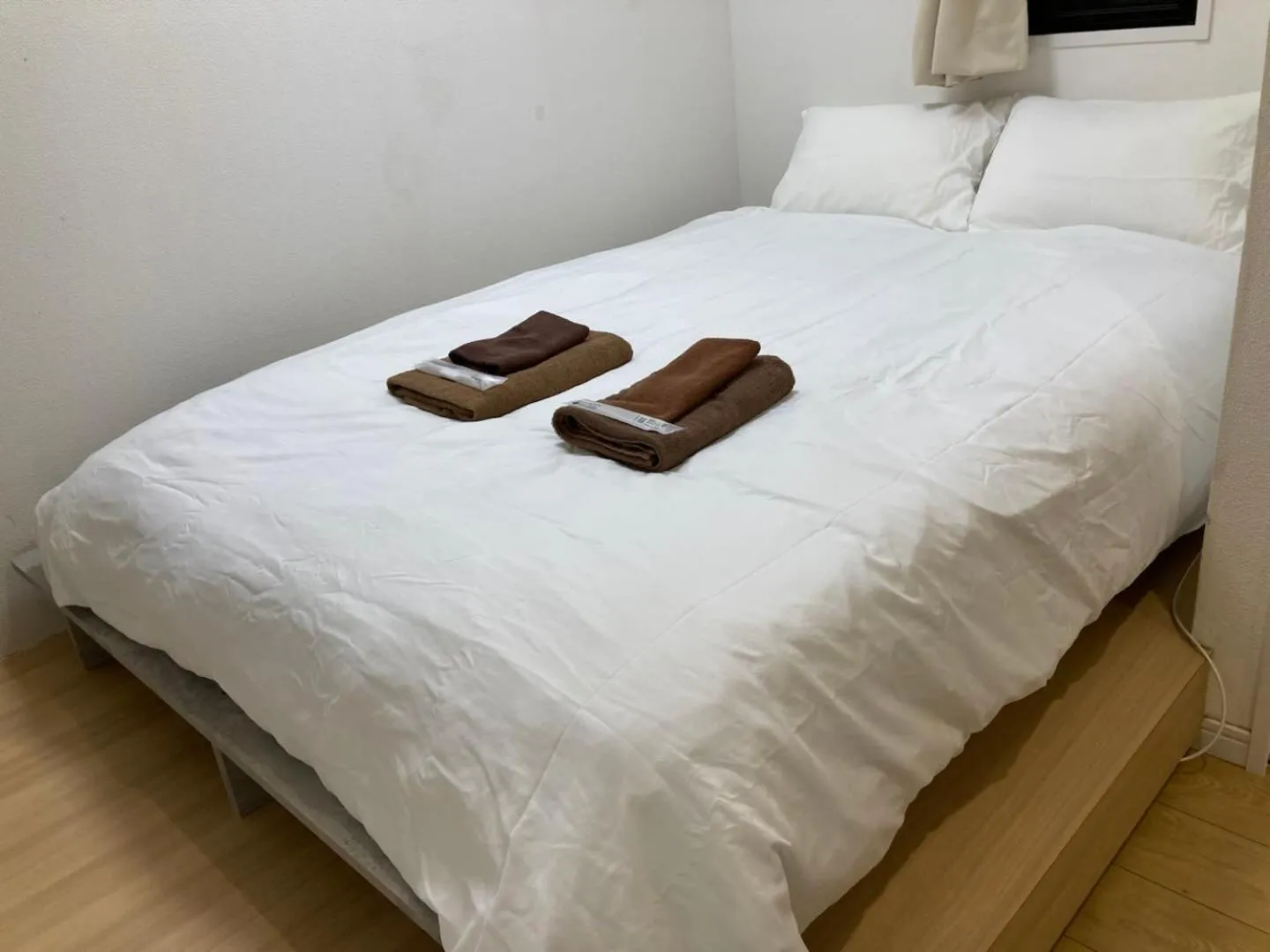 Bed in nestay inn tokyo kagurazaka