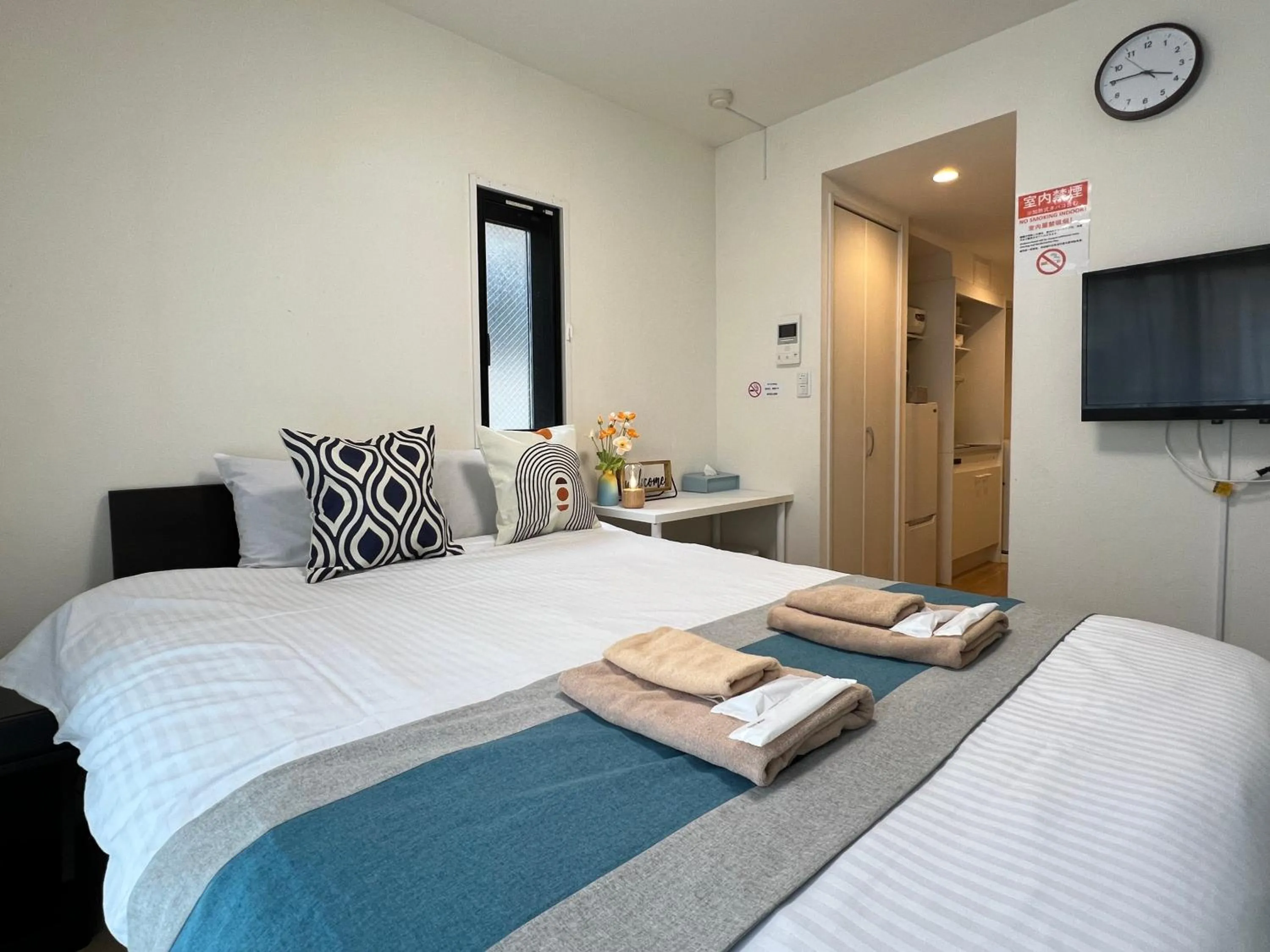 Bed in nestay inn tokyo kagurazaka