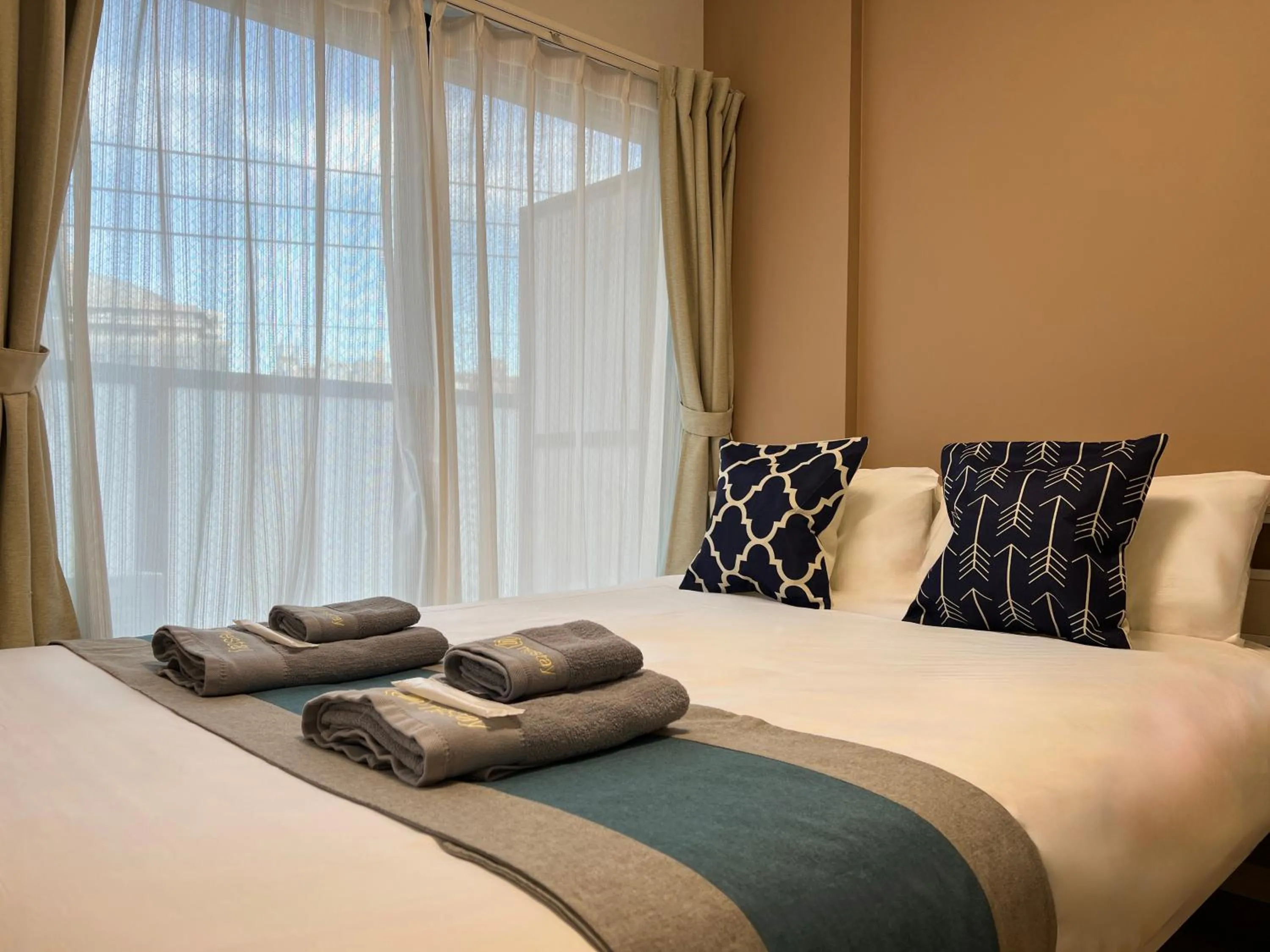 Bed in nestay inn tokyo kagurazaka