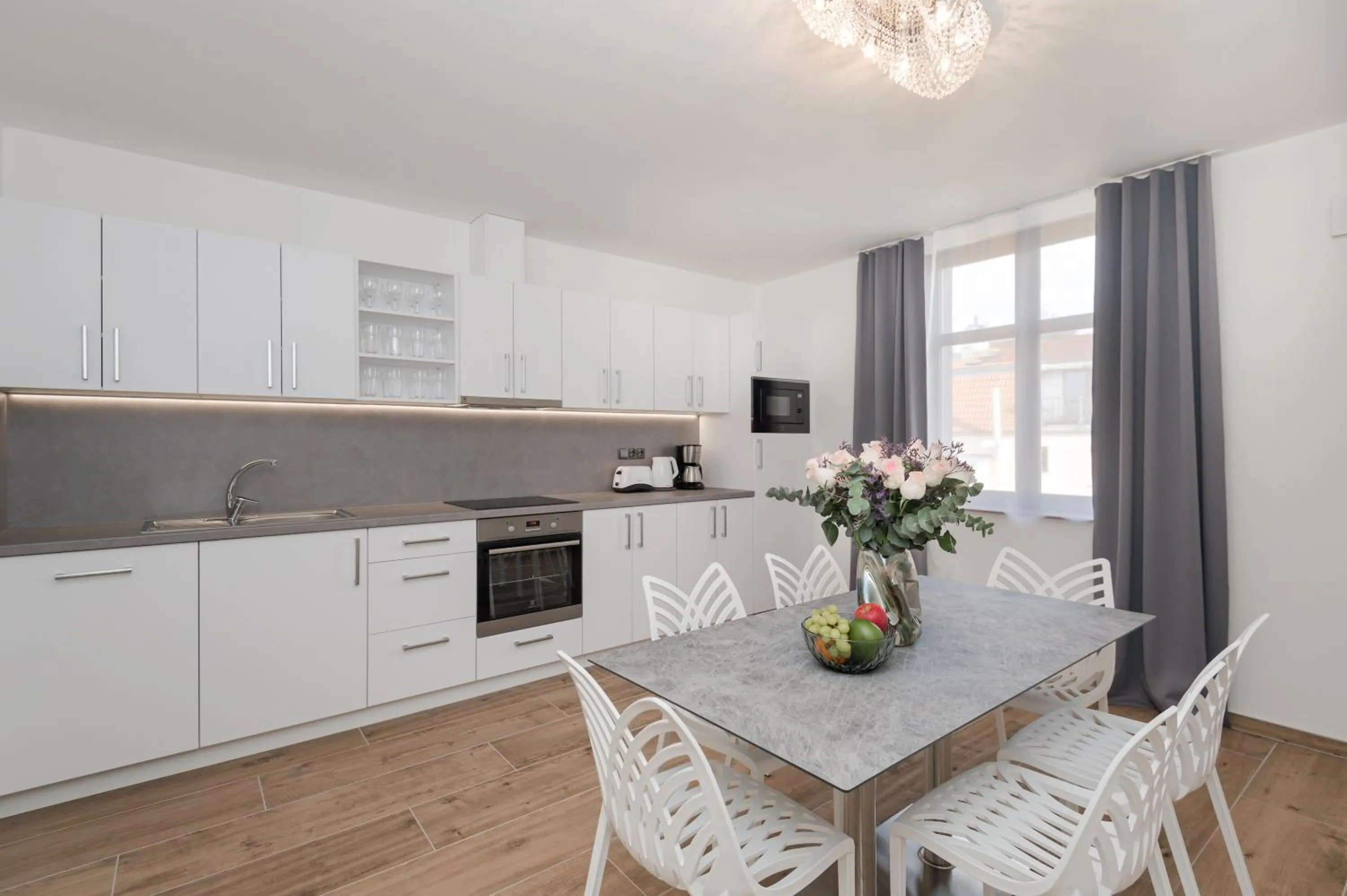 Kitchen or kitchenette in Eight Secrets Boutique Residence by Dwellfort