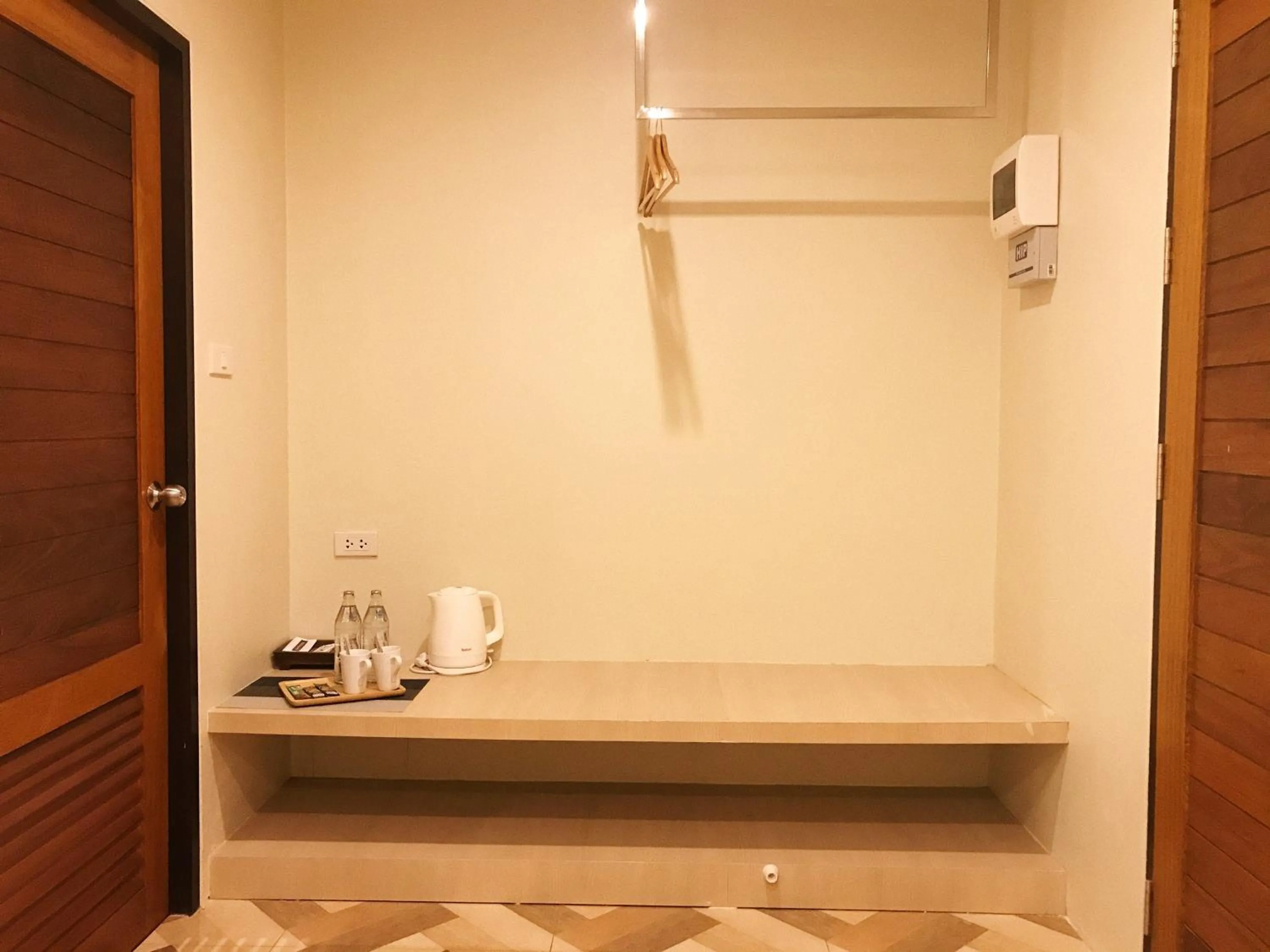 wardrobe in SJ Miracle Hotel