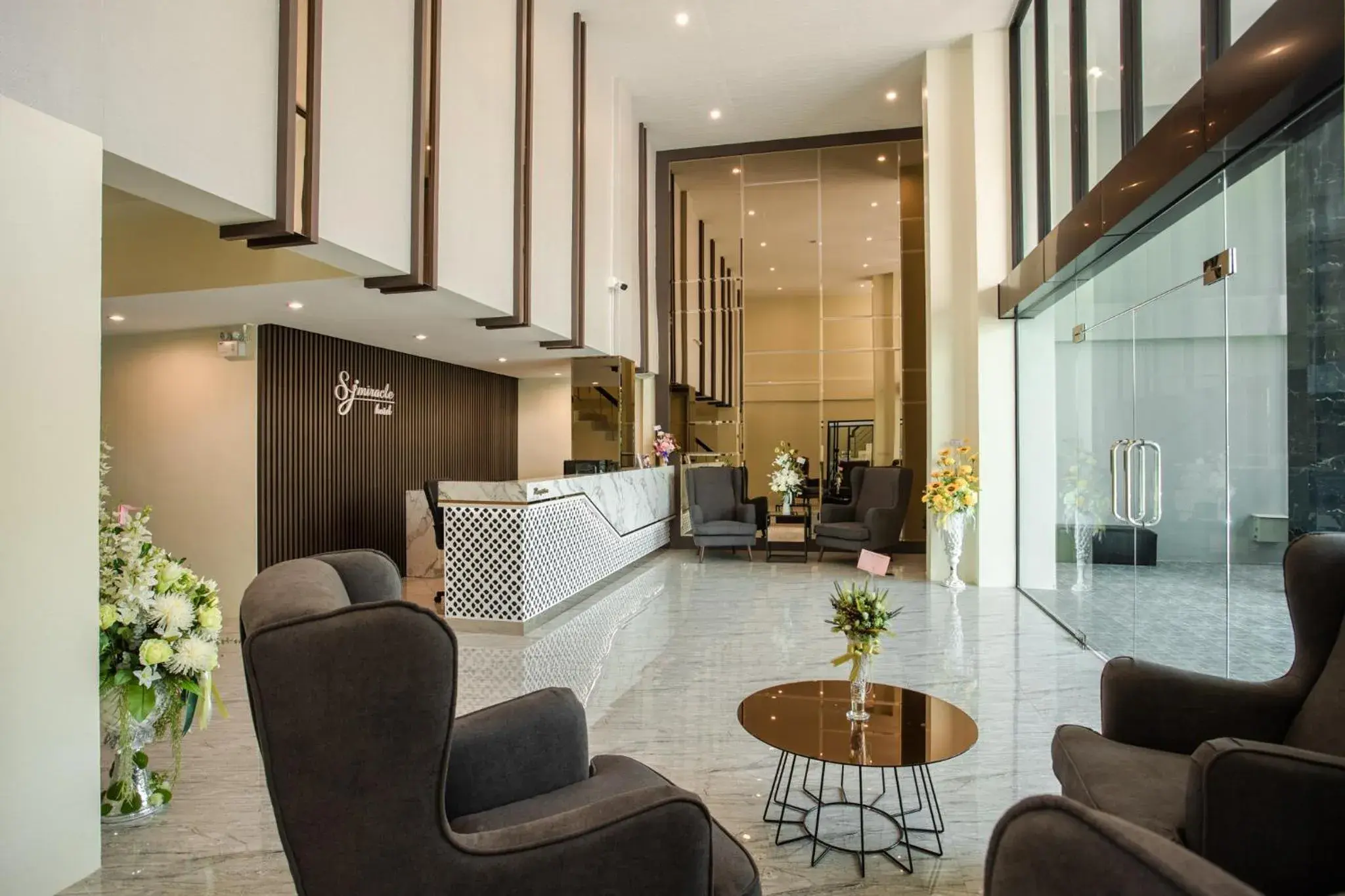 Lobby or reception in SJ Miracle Hotel Lobby or reception in SJ Miracle Hotel