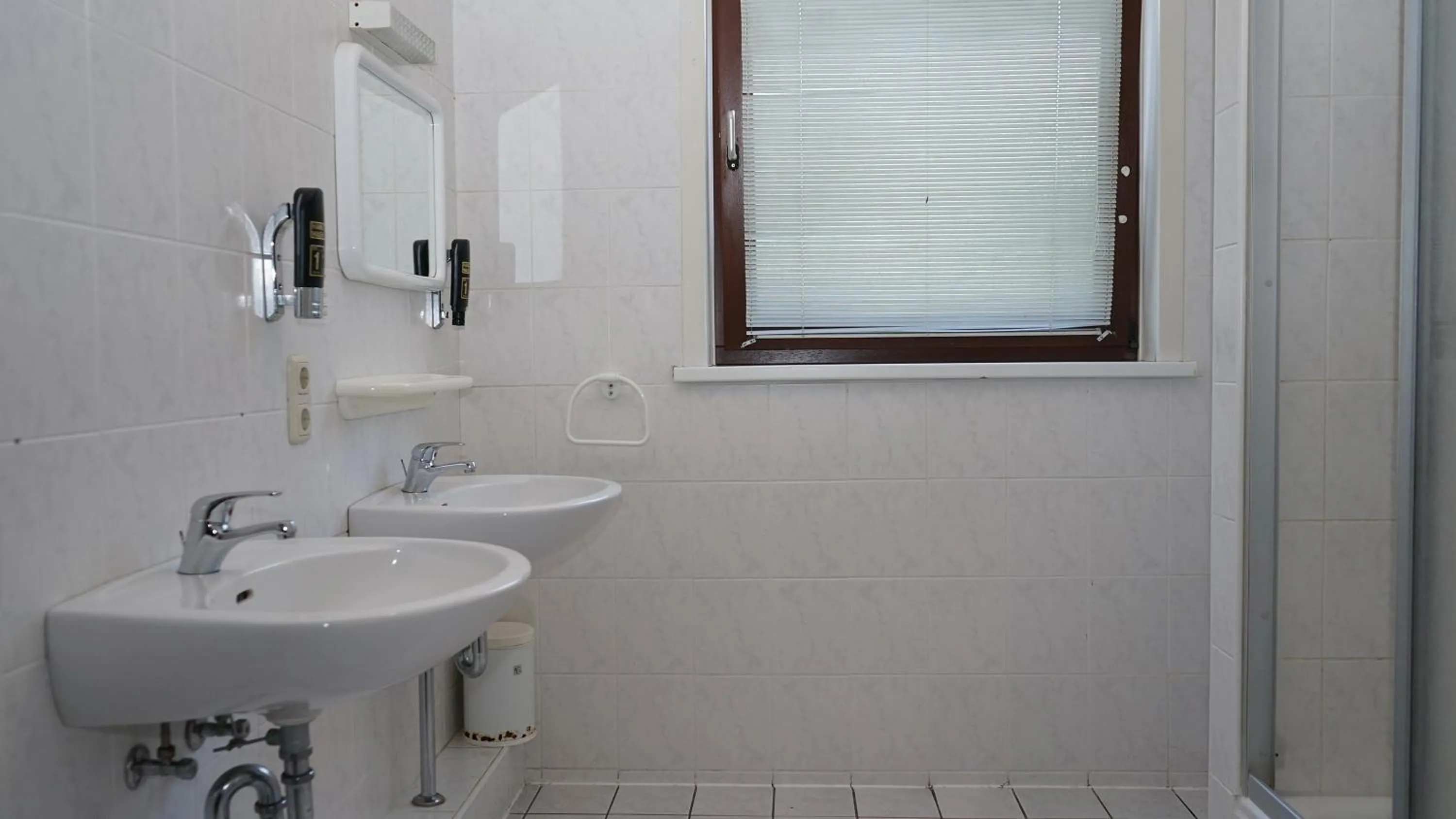 Bathroom in ITM Entrée Glinde Restaurant & Tagungshotel