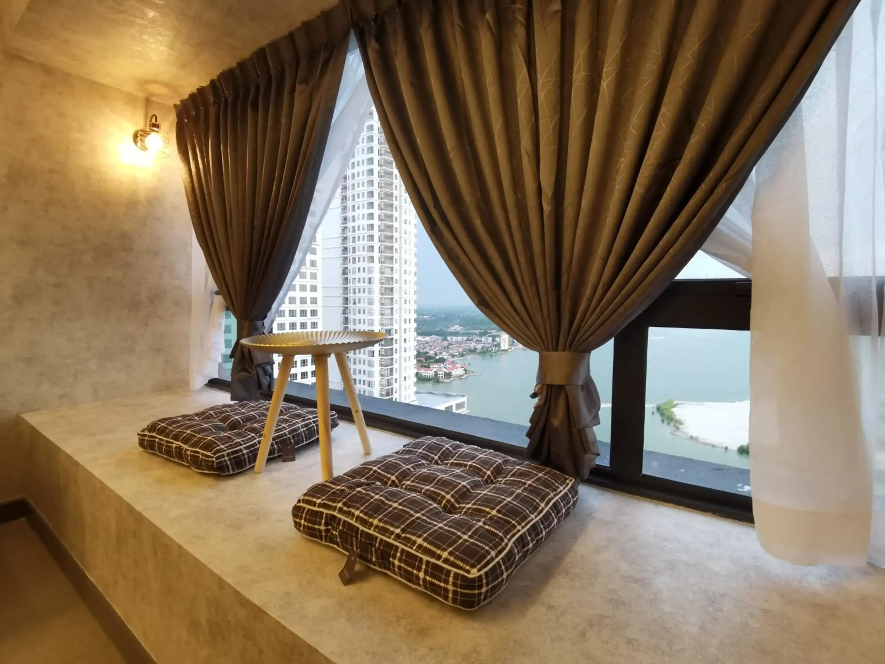 Seating area, Bed in Attic Home Melaka Imperio Residence & Jonker Seating area, Bed in Attic Home Melaka Imperio Residence & Jonker