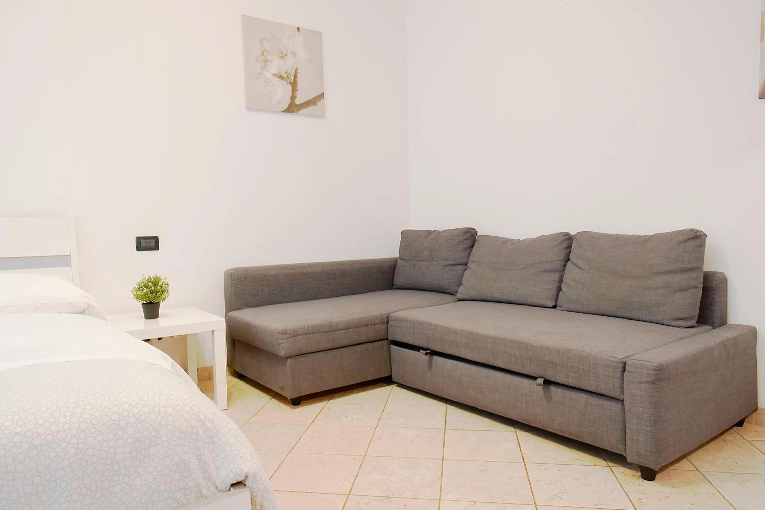Living room, Bed in Philips apartment centro citta Corso Italia