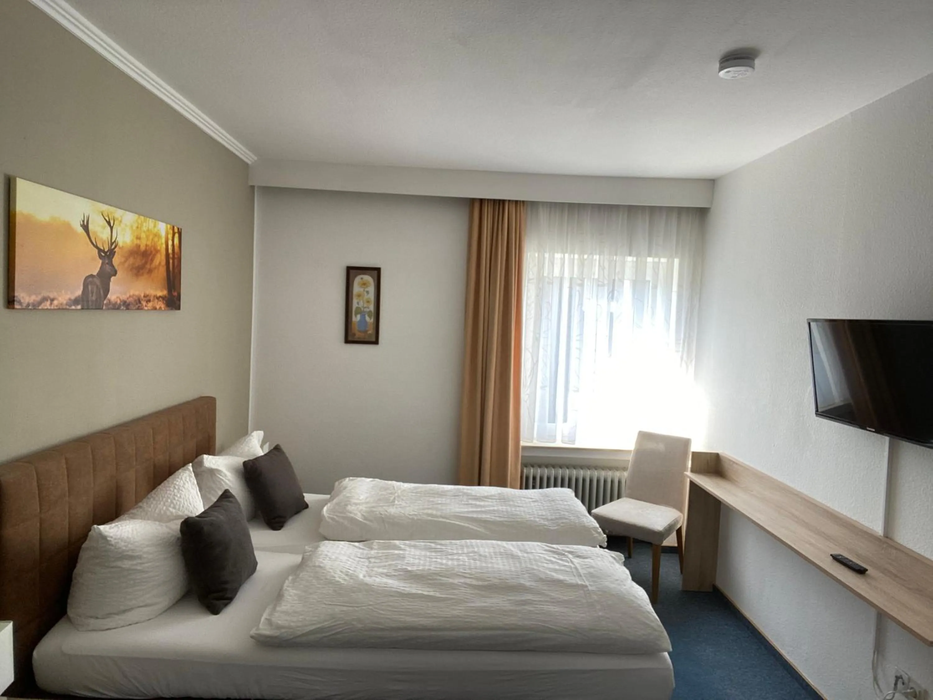 Bed in Sevda's Hotel Garni Weinforth