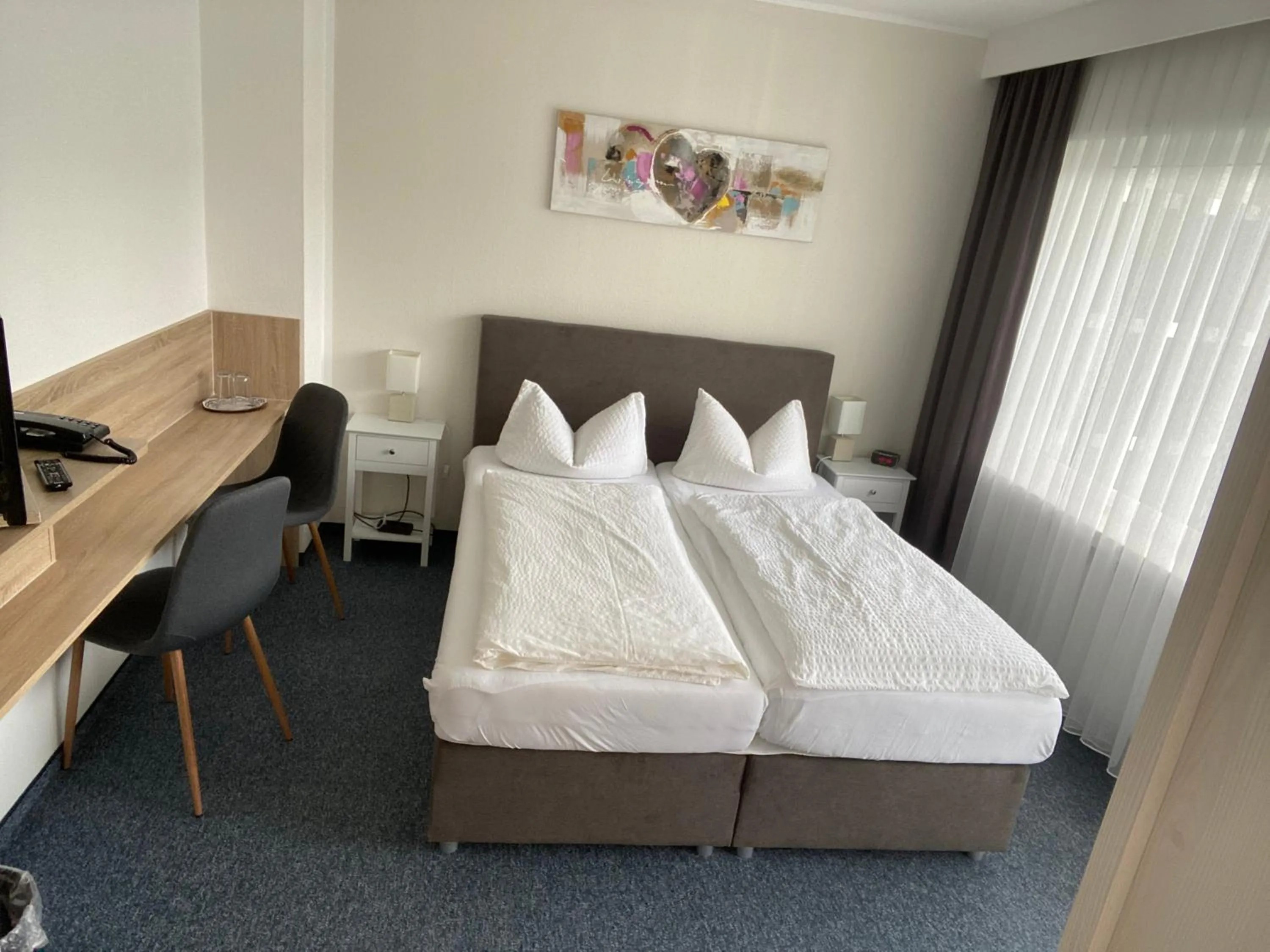 Photo of the whole room, Bed in Sevda's Hotel Garni Weinforth