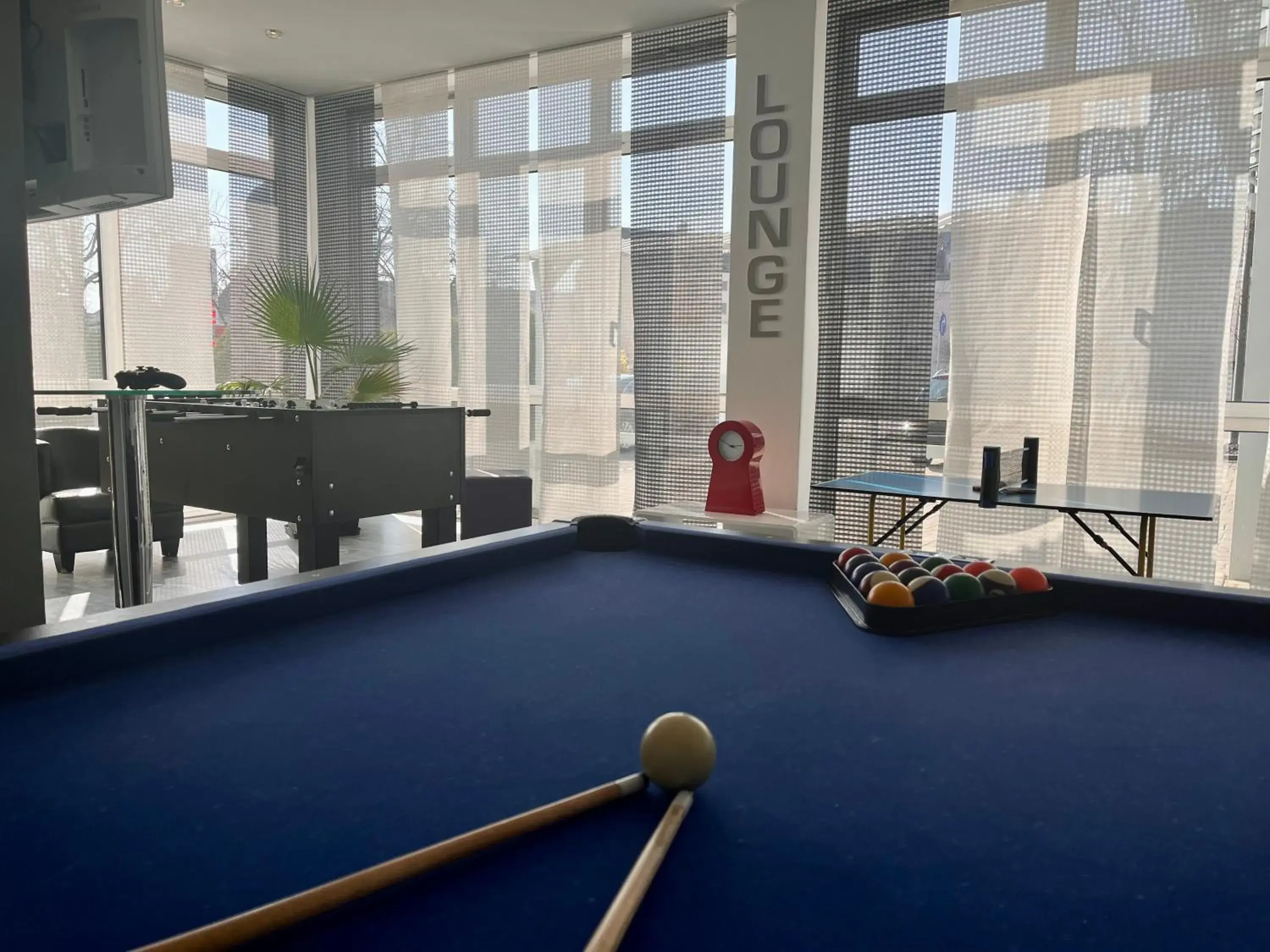 Lounge or bar in QU Hotel Augsburg Lounge or bar in QU Hotel Augsburg