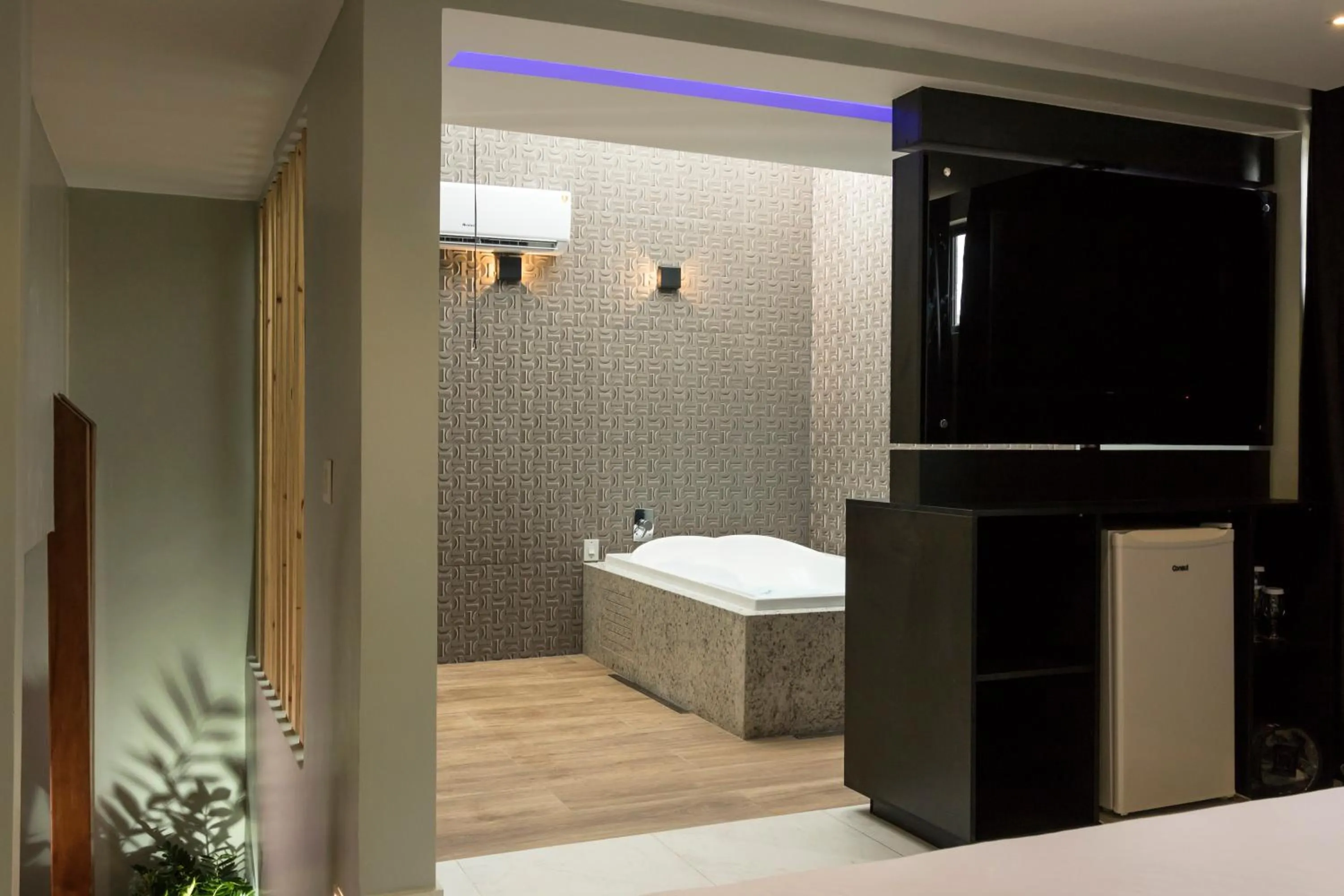 Communal lounge/ TV room, Bed in Drops Motel Brasília