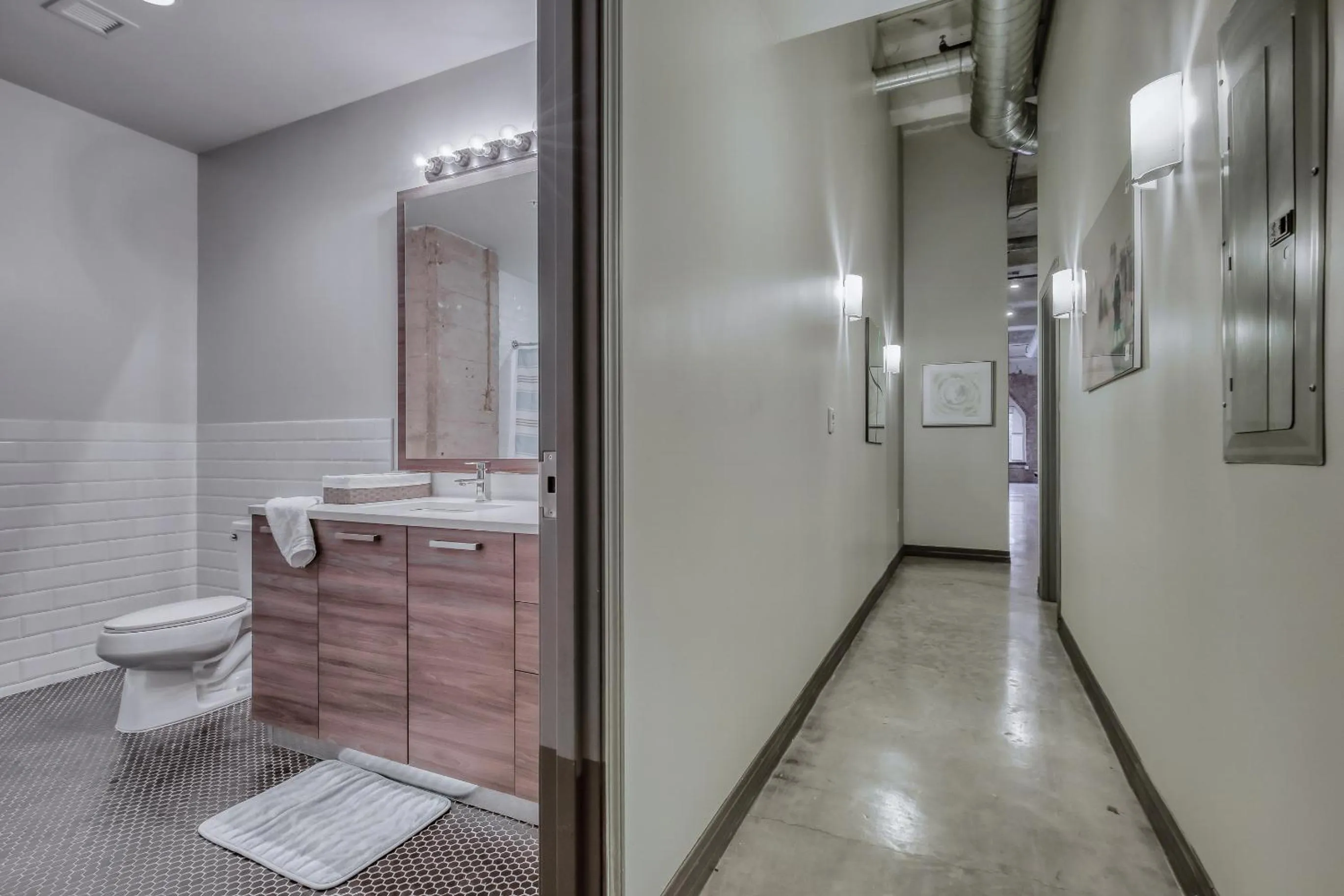 Toilet in Luxury Downtown Dallas Stay by Amyfinehouse